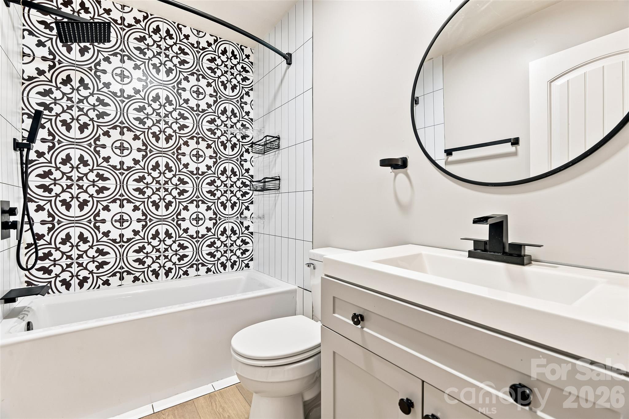 Left Side -  updated bathroom with accent tile. - 160 State Street, Asheville