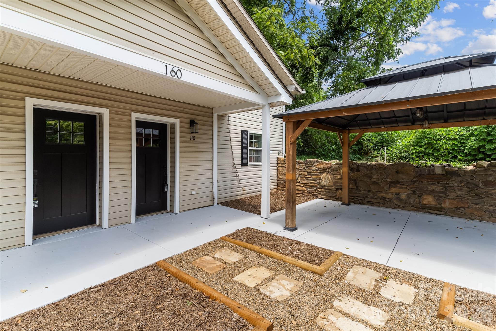Looking toward the right side with pergola. - 160 State Street, Asheville