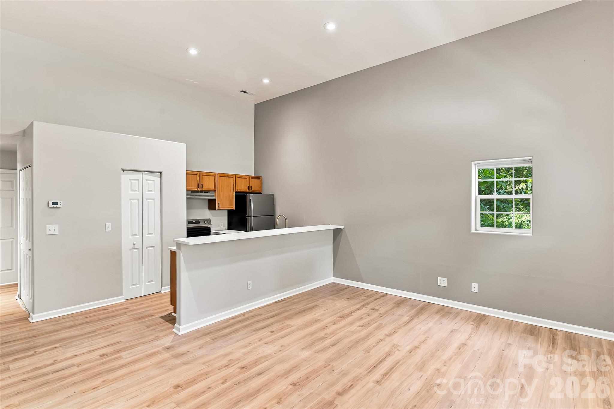 Right side - looking from the front door towards the kitchen and hallway. - 160 State Street, Asheville