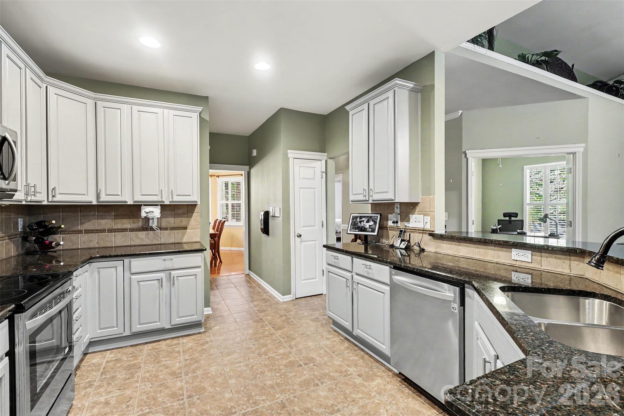 Kitchen (View to Formal Dining and Front Entrance) - 6332 Colonial Garden Drive, Huntersville