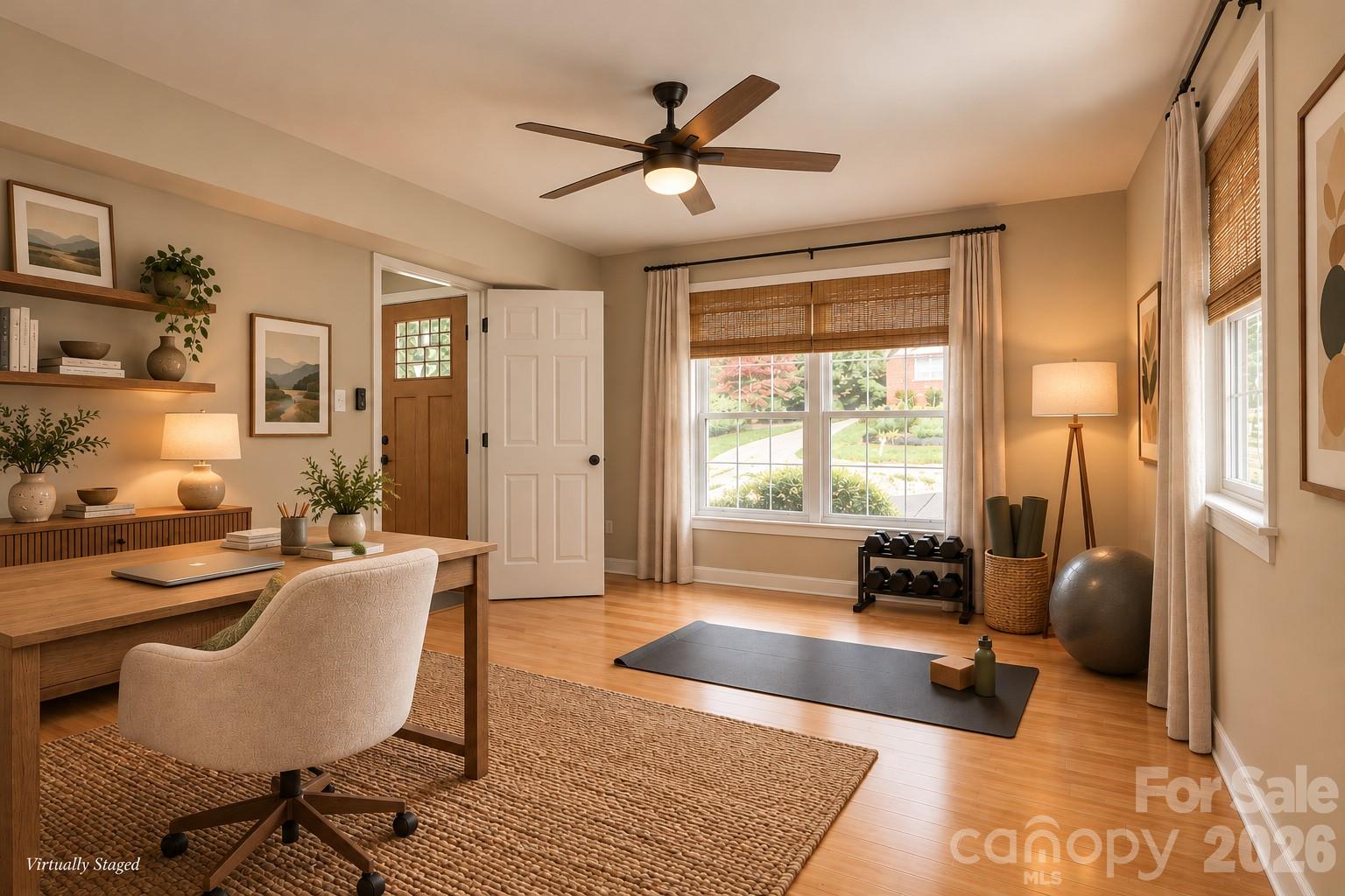 Virtually staged bonus room on the main level that could be a great home office, workout space or cozy den. - 17 Sheridan Road, Asheville