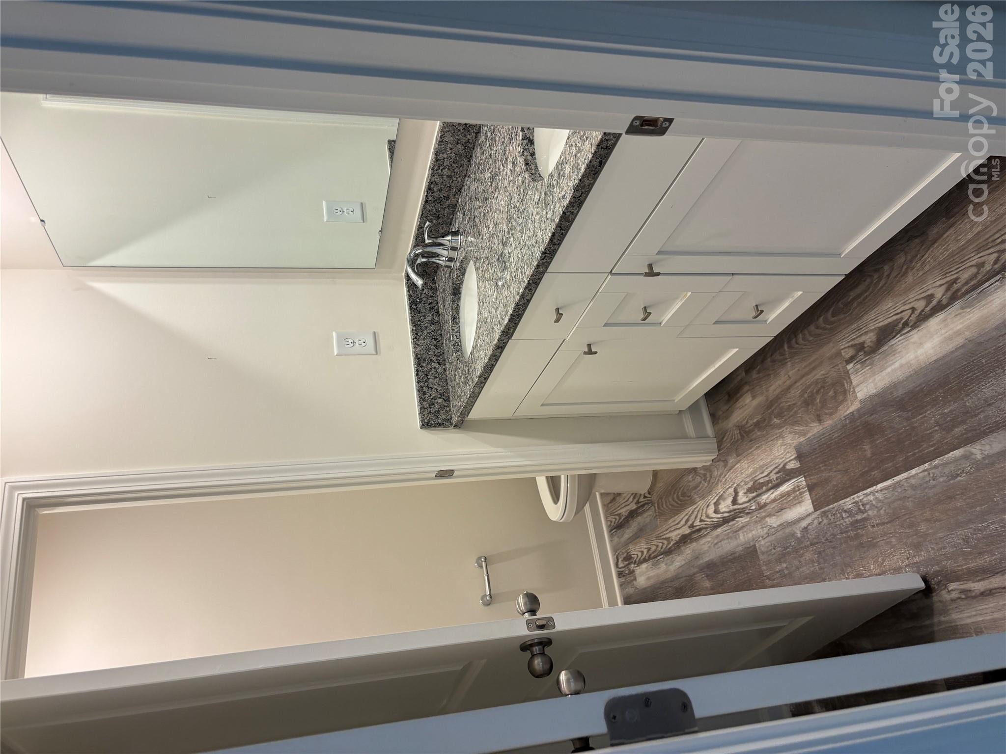 Hall bath with double granite sinks, tub and toilet room - 113 Stoney Lane, Cherryville