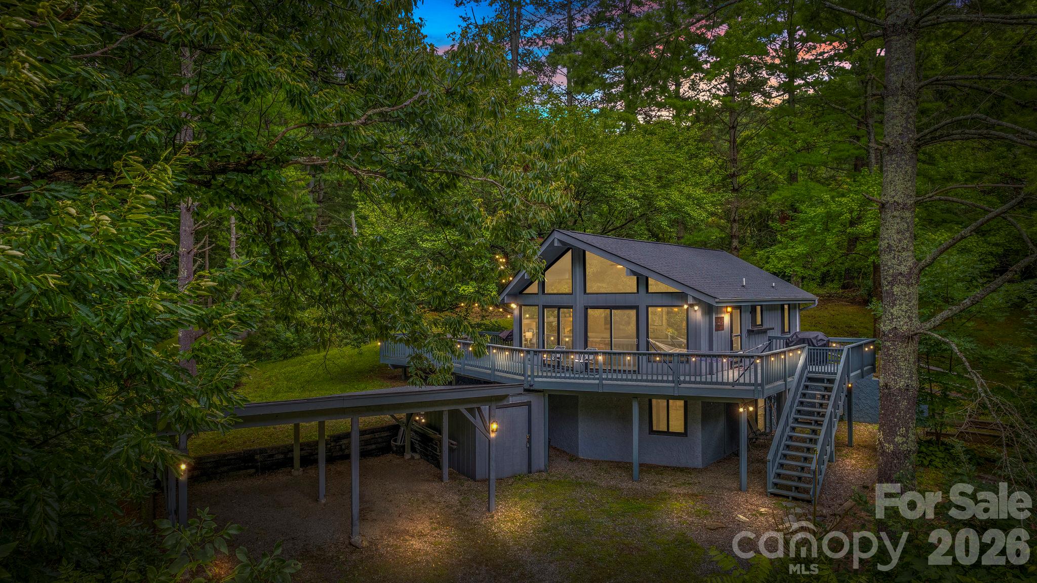 Wooded setting with wraparound deck - 266 Chestnut Walk Drive, Waynesville