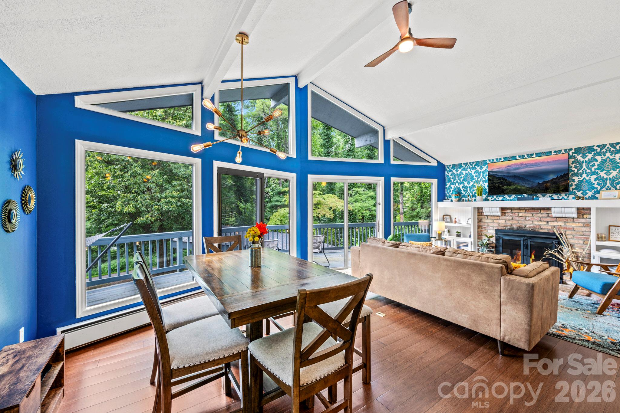 Vaulted ceilings and walls of glass - 266 Chestnut Walk Drive, Waynesville