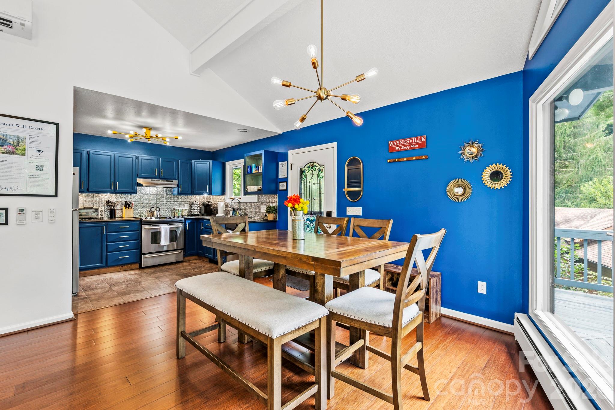 Dining area flowing into kitchen - 266 Chestnut Walk Drive, Waynesville