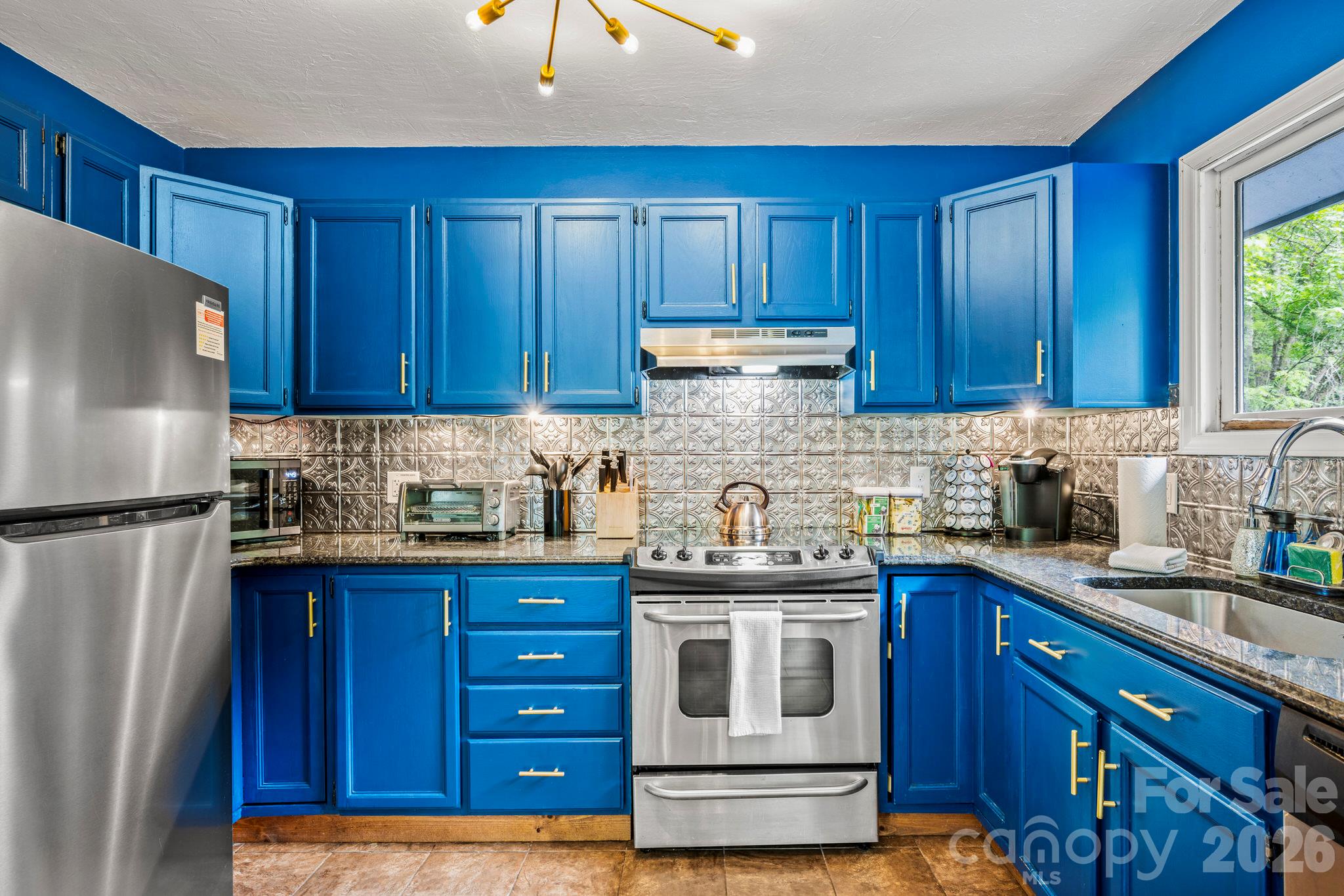 Stainless steel appliances - 266 Chestnut Walk Drive, Waynesville