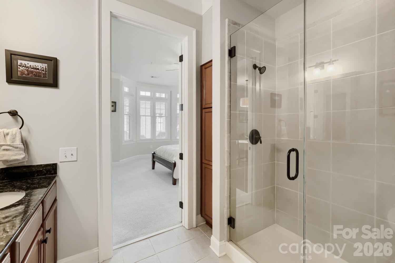 Primary bathroom glass shower - 2810 Selwyn Avenue, Charlotte