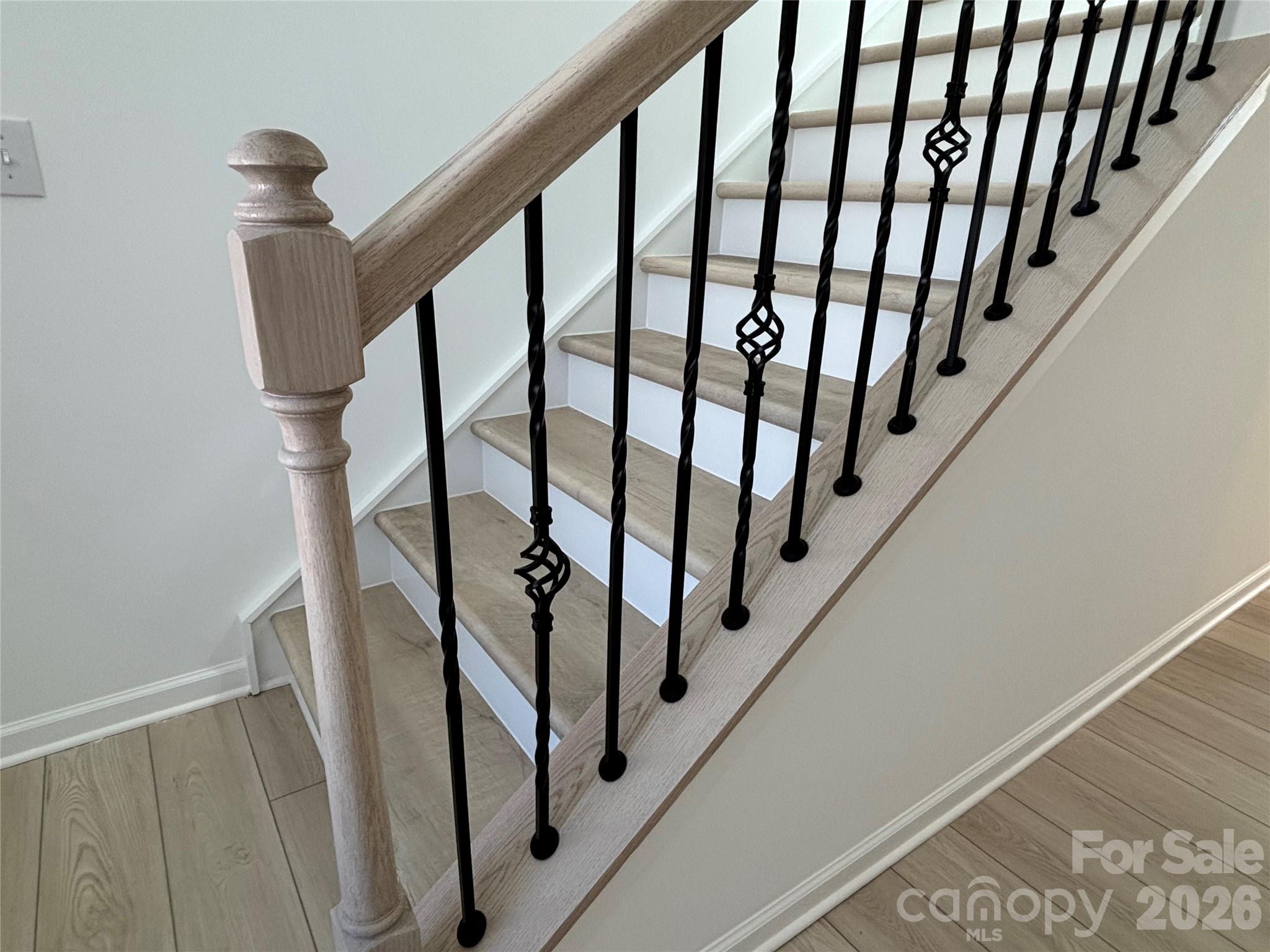 OOh, Pretty spindles on the stairs... with, what??? NO CARPET! - 1645 Grassy Knoll Trail, Maiden