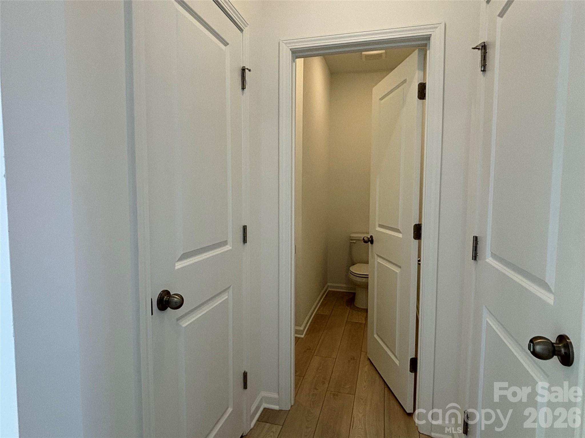 Powder room, coat closet and door to the garage - 1645 Grassy Knoll Trail, Maiden