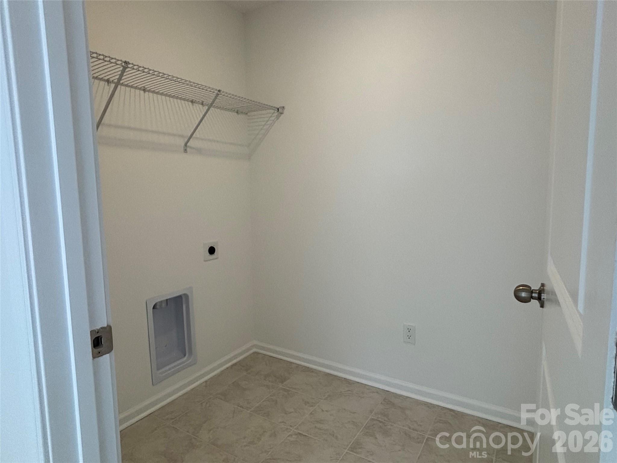 Laundry Room upstairs... fold laundry in your loft while you have something on TV=) - 1645 Grassy Knoll Trail, Maiden