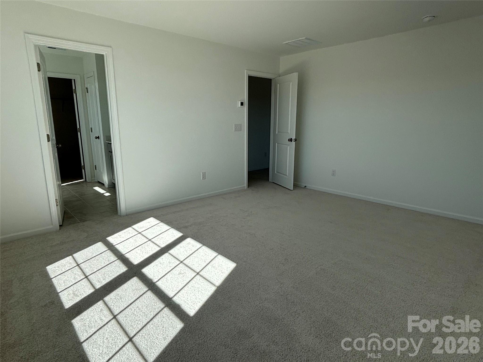 Your primary bedroom leading to your primary bath... - 1645 Grassy Knoll Trail, Maiden