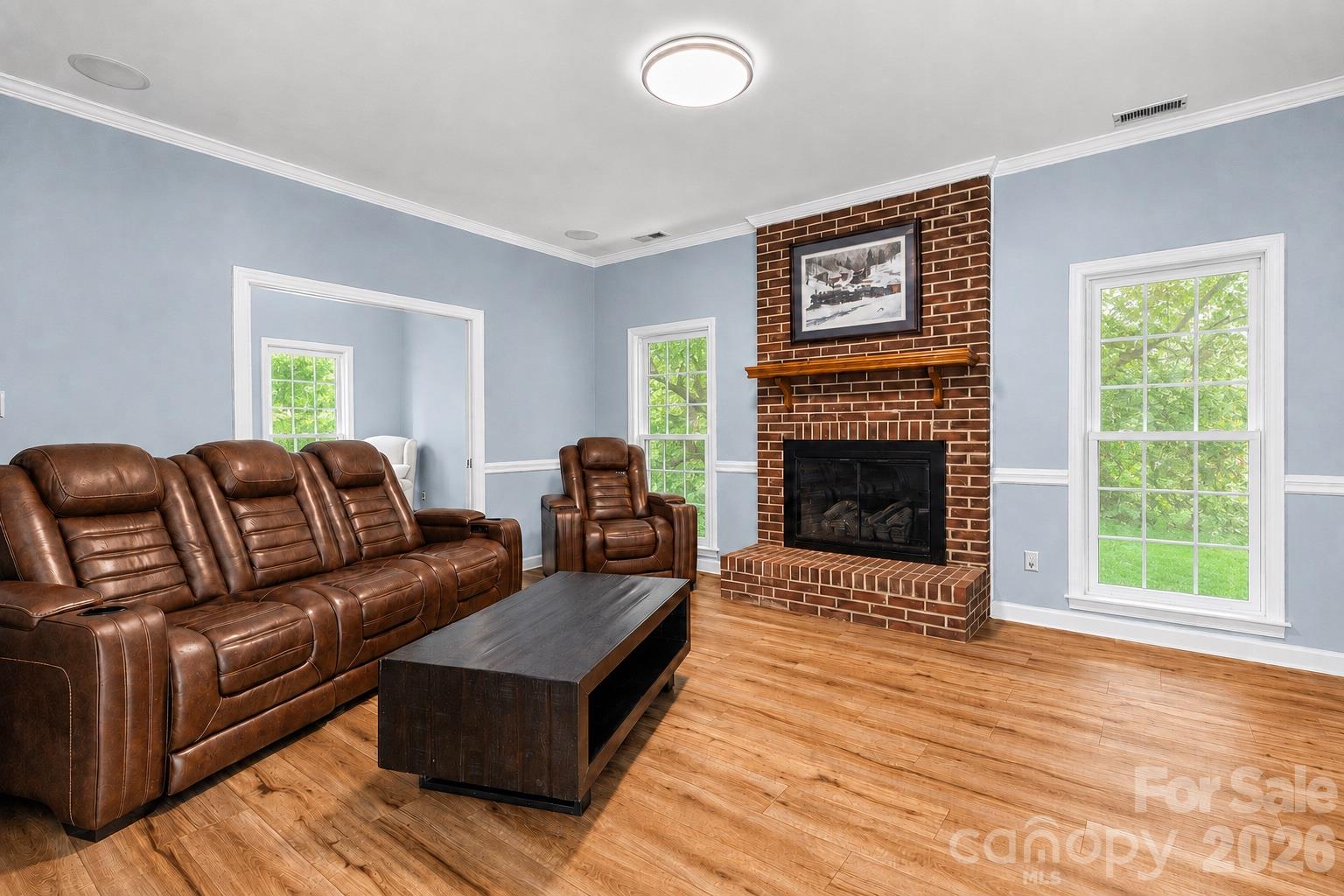 Spacious living room connecting to office space. - 635 Highland Ridge Road, Mooresville