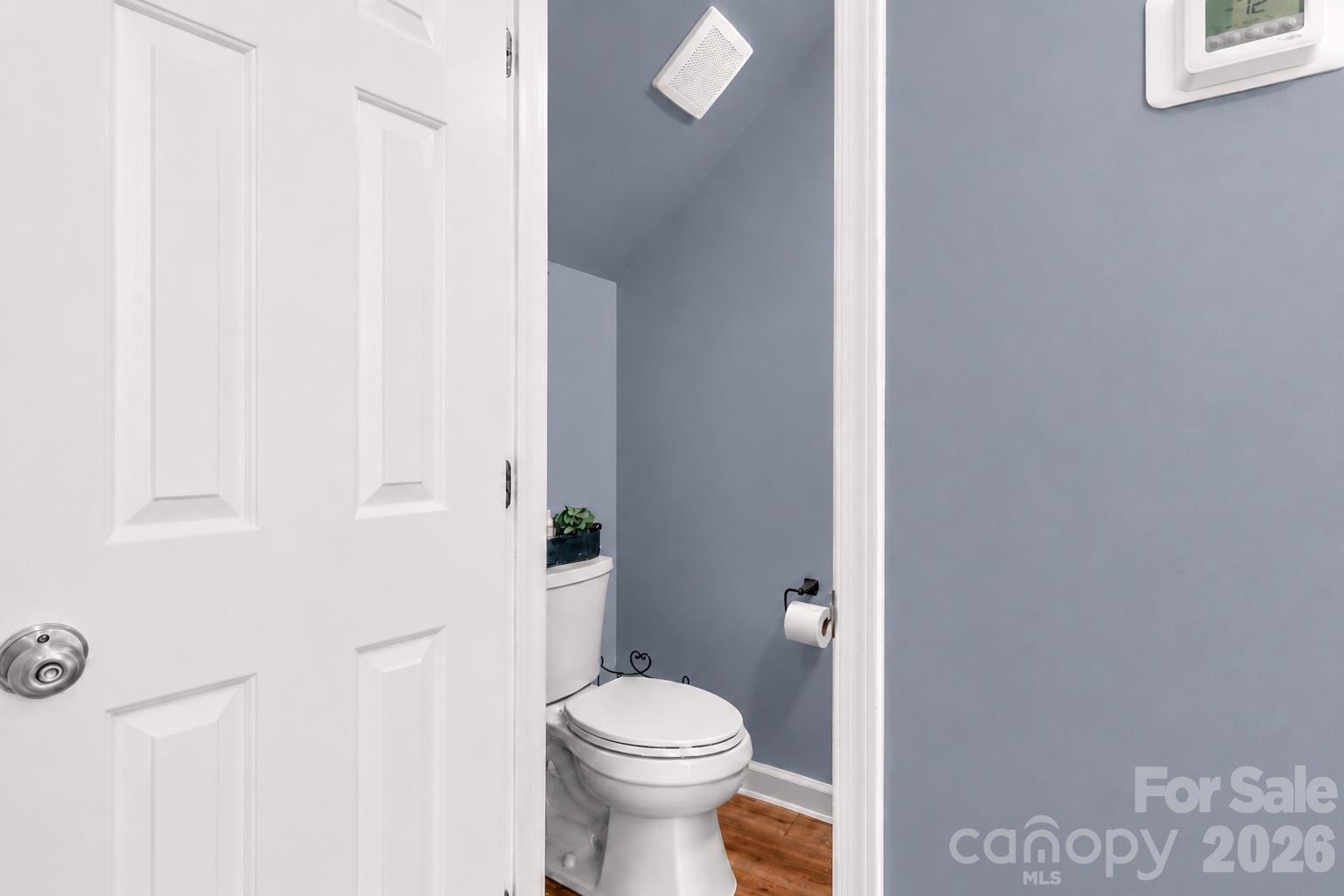 Main level half bathroom. - 635 Highland Ridge Road, Mooresville