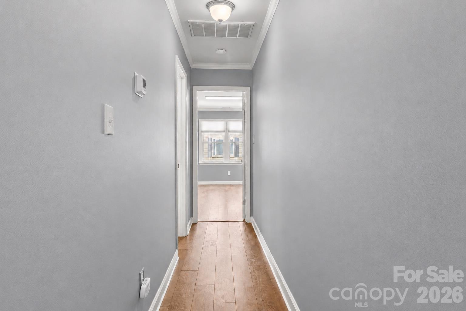 Hallway toward third guest bedroom and full bathroom located on left hand side. - 635 Highland Ridge Road, Mooresville