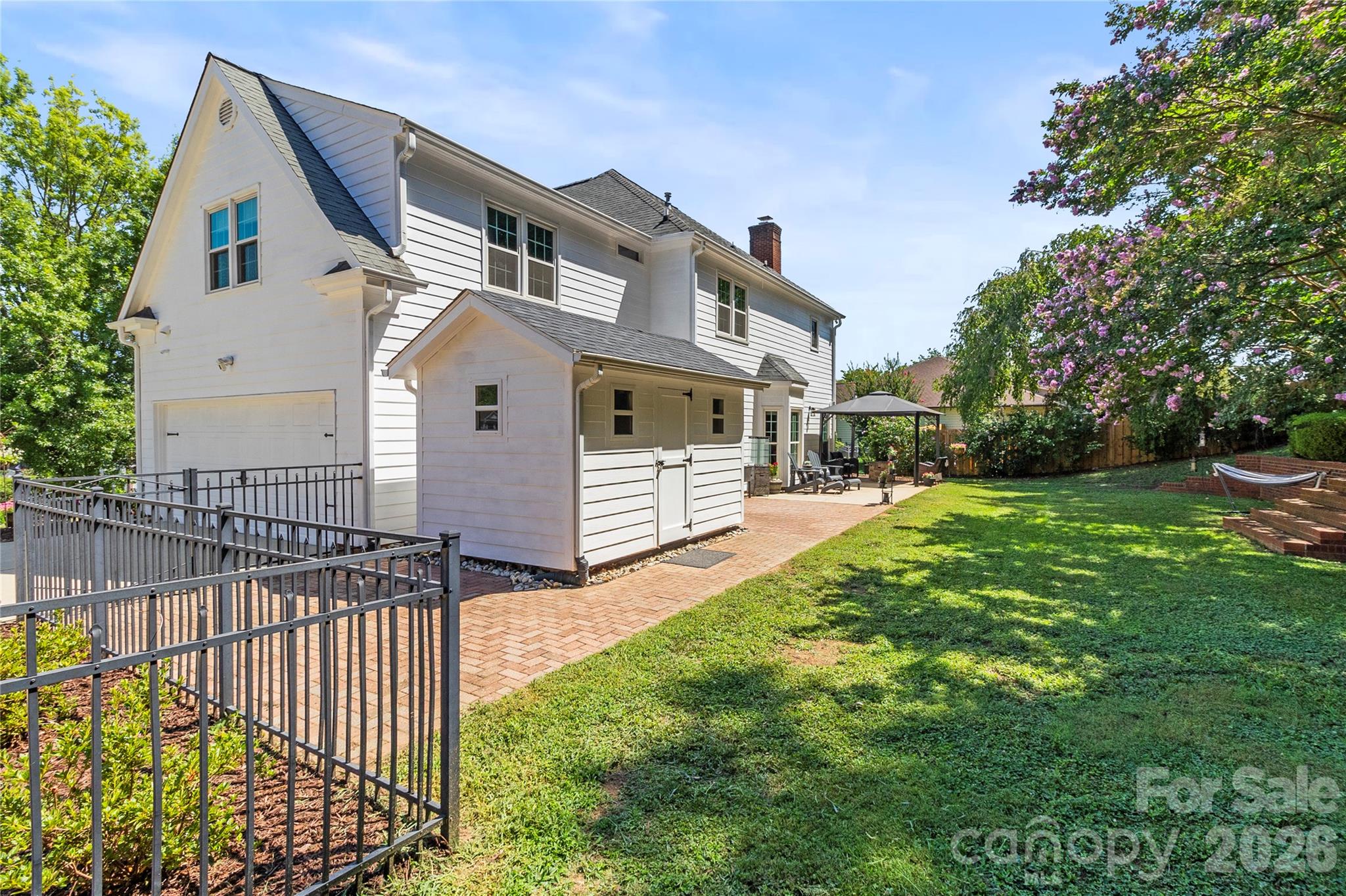 Spacious shed located with easy access on backyard patio. - 635 Highland Ridge Road, Mooresville