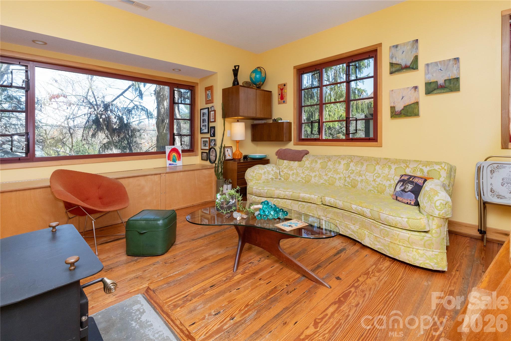 2nd floor living room with previous staging furniture - 297 Hillside Street, Asheville