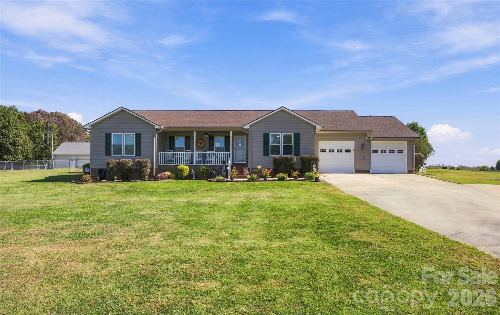 Well maintained home with rocking chair front porch on nearly an acre - 643 Shoal Road, Lincolnton