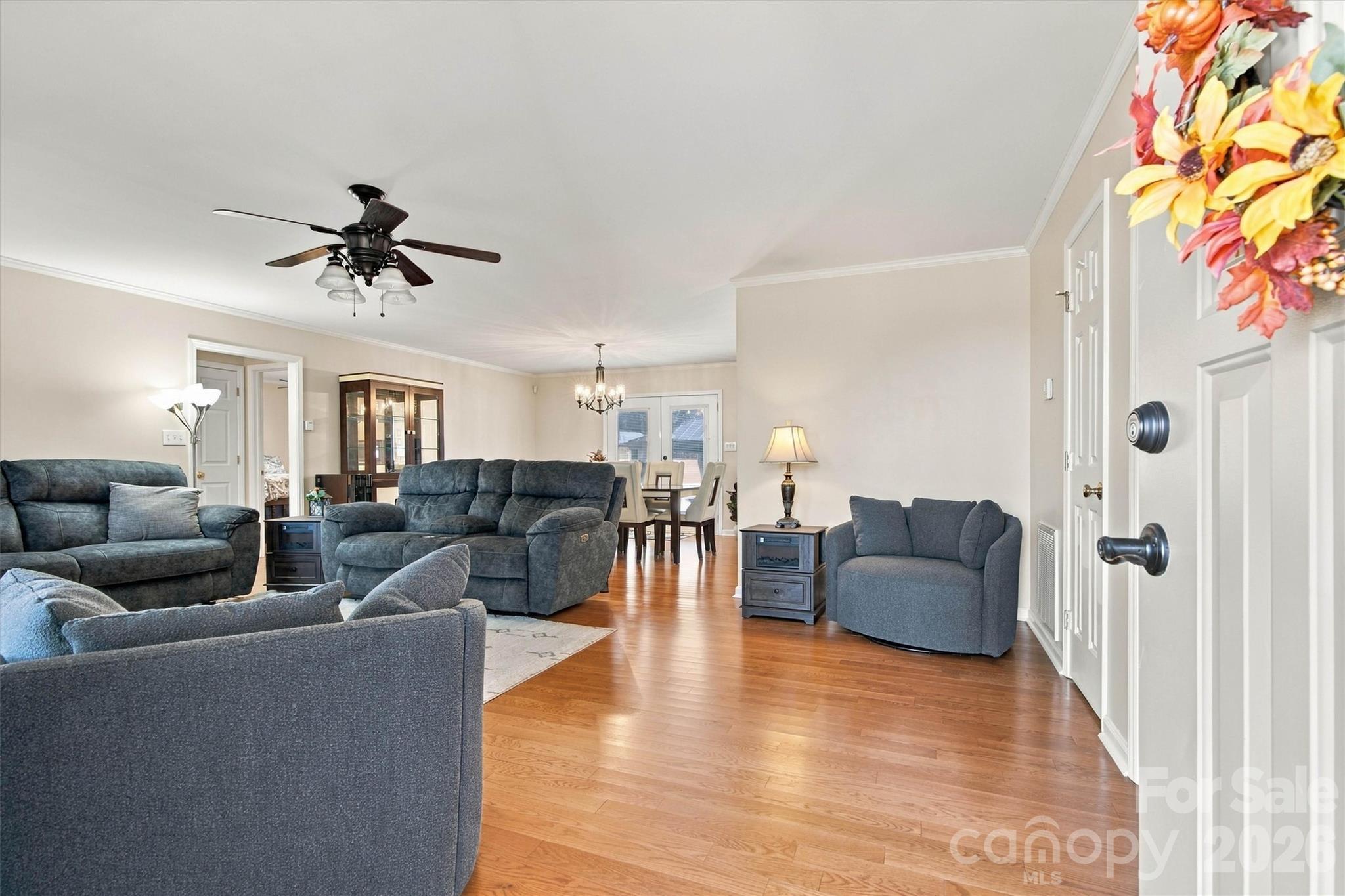 Front entry into large Living Room with gleaming hardwood floors - 643 Shoal Road, Lincolnton