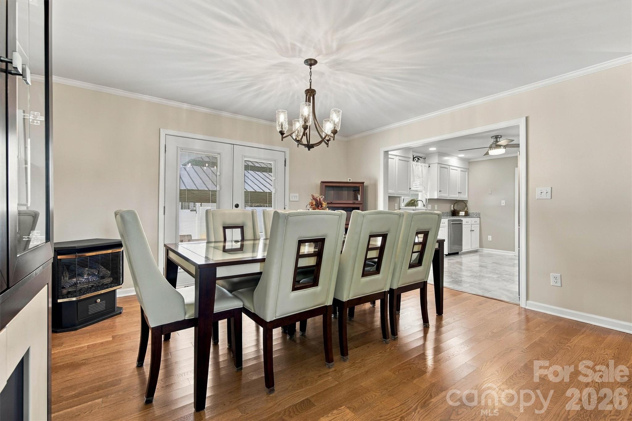 Dining Area is located adjacent to Kitchen with an exit to the amazing outdoor entertaining area - 643 Shoal Road, Lincolnton