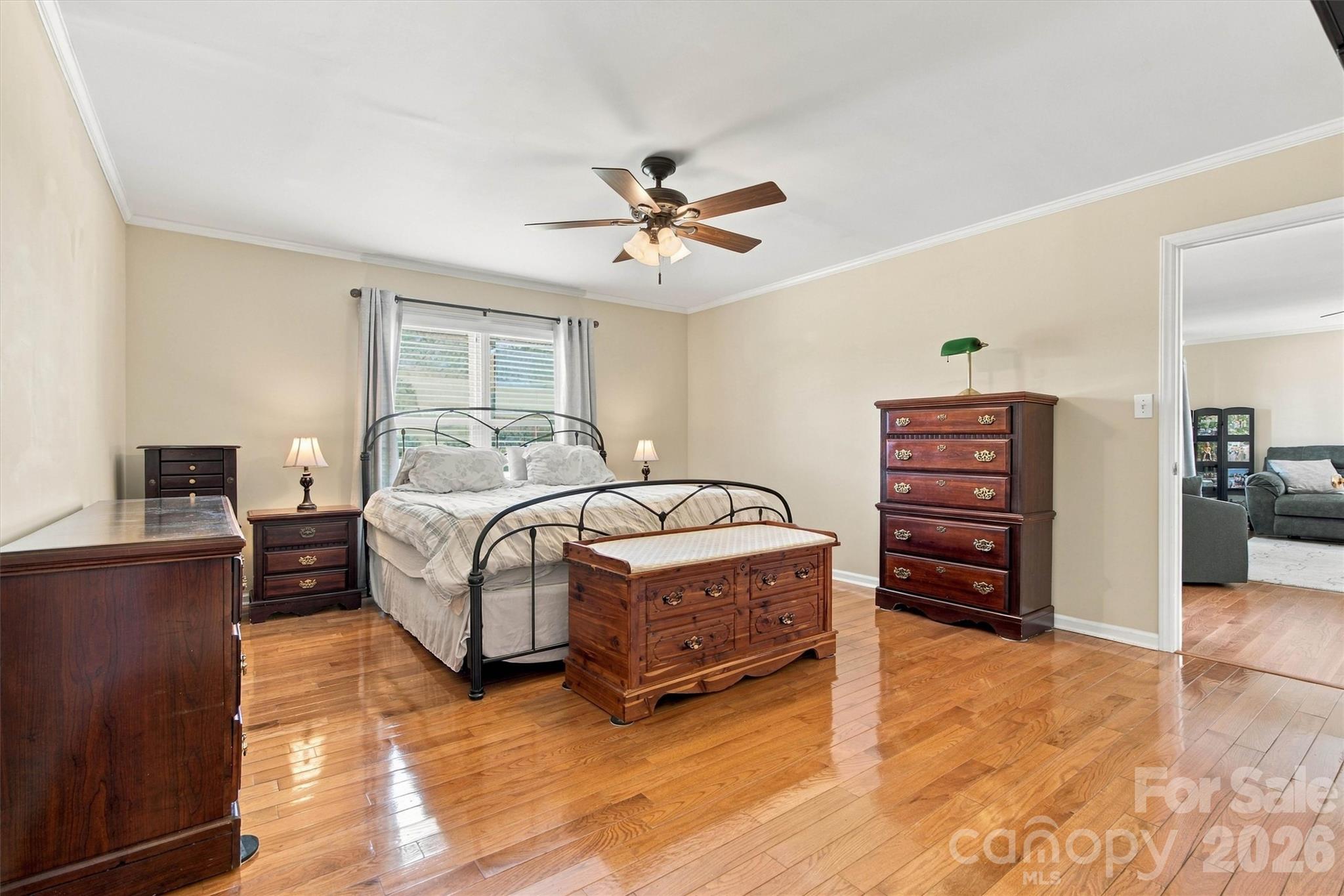 Spacious Primary Bedroom is separated from the other two bedrooms by the Living Room - 643 Shoal Road, Lincolnton