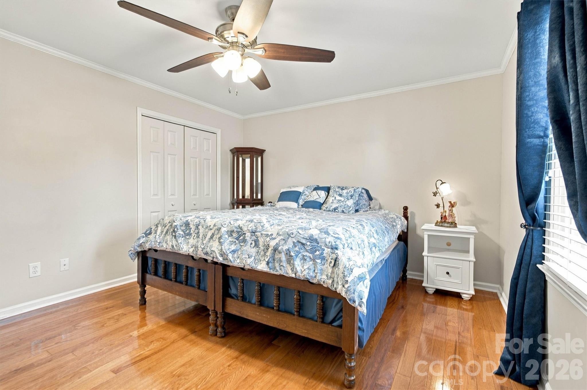 Another view of third bedroom also featuring gleaming hardwood floors and ceiling fan - 643 Shoal Road, Lincolnton