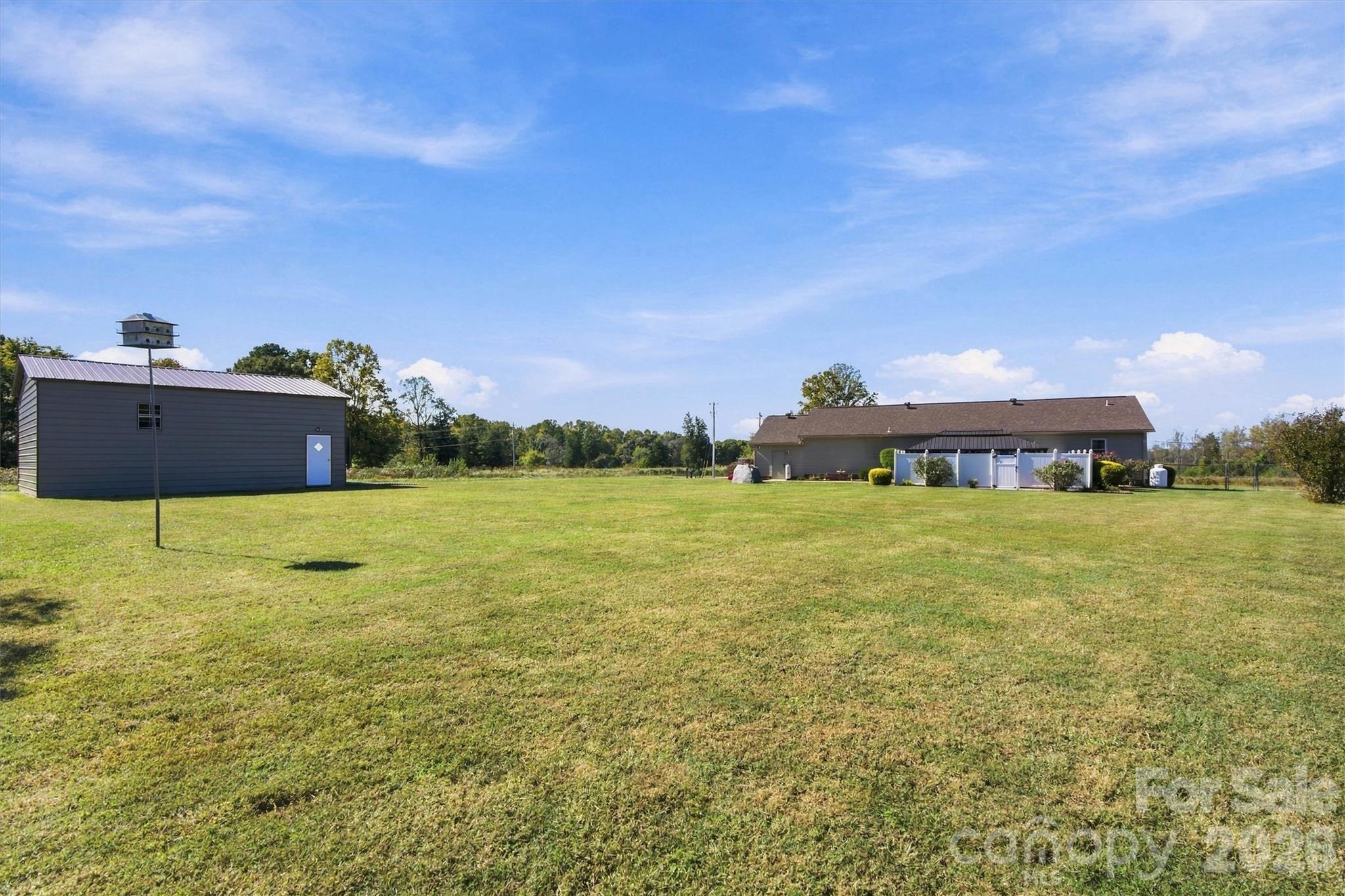 Detached garage can also be accessed by the gravel road beside the home, Western Sky Ct. - 643 Shoal Road, Lincolnton
