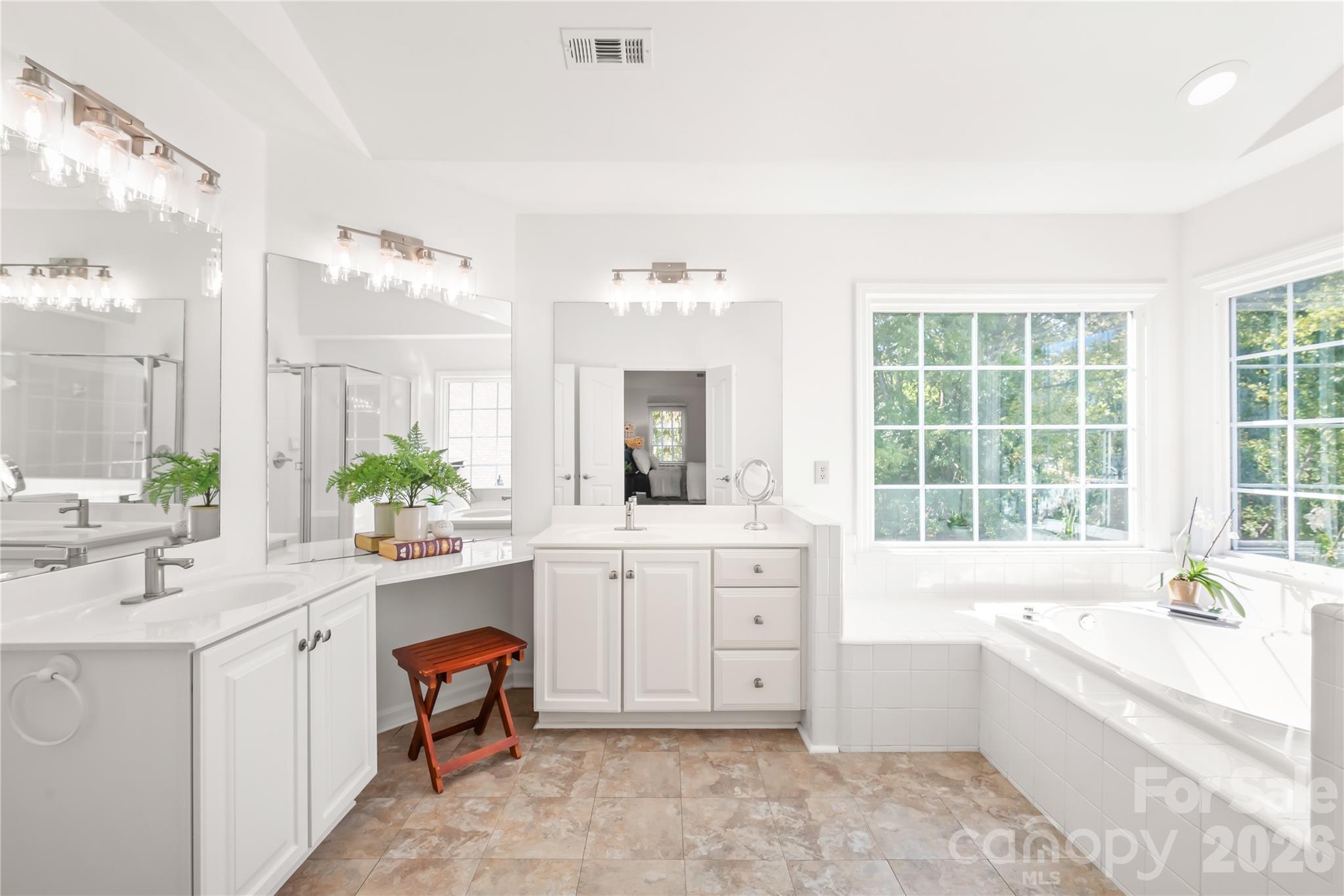This expansive ensuite offers generous square footage, flexible layout options, and abundant space to customize your ultimate everyday spa escape. - 11024 Stonepath Lane, Charlotte