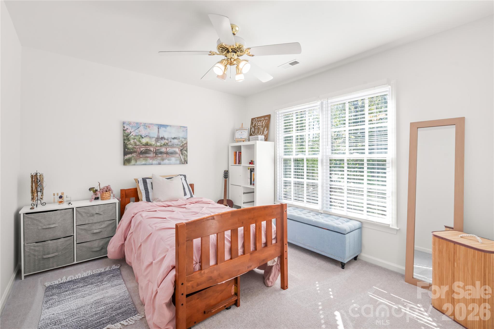 Bedroom three is completely refreshed with clean, modern paint and plush new carpet (2026). - 11024 Stonepath Lane, Charlotte