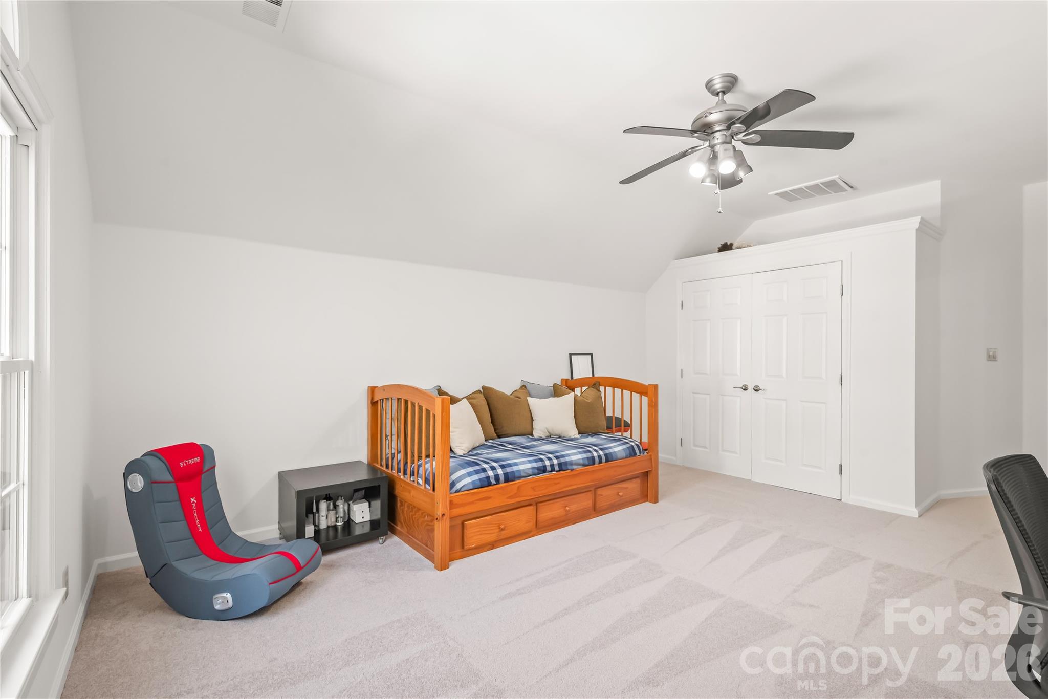 Endless possibilities await in bedroom four...ideal for a vibrant playroom, or comfortable guest suite. - 11024 Stonepath Lane, Charlotte