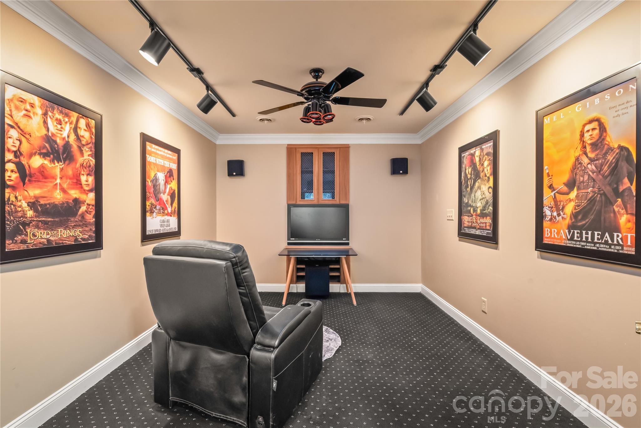 Located just off the office, this versatile media or flex room is ready to transform into whatever fits your lifestyle...could even be your personal gym. - 11024 Stonepath Lane, Charlotte