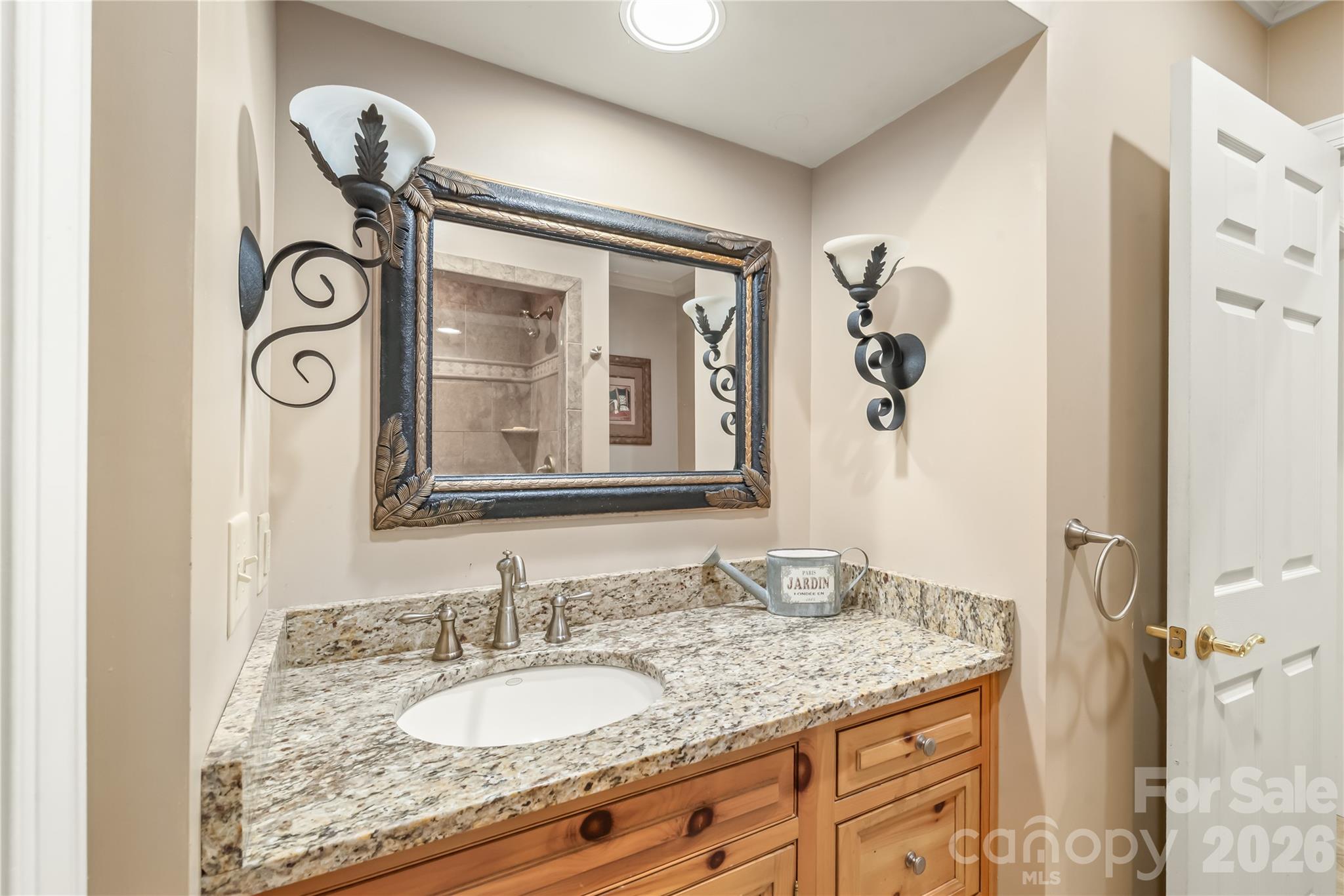 Complete lower-level convenience...this full basement bathroom features a sleek walk-in shower, offering effortless comfort and privacy for guests or everyday living. - 11024 Stonepath Lane, Charlotte