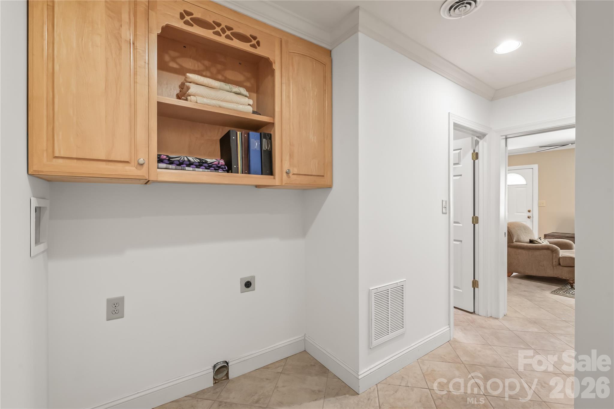 Ultimate convenience on every level...the walk-out basement also features a second laundry area, making extended guest stays or movie-night cleanups completely effortless. - 11024 Stonepath Lane, Charlotte