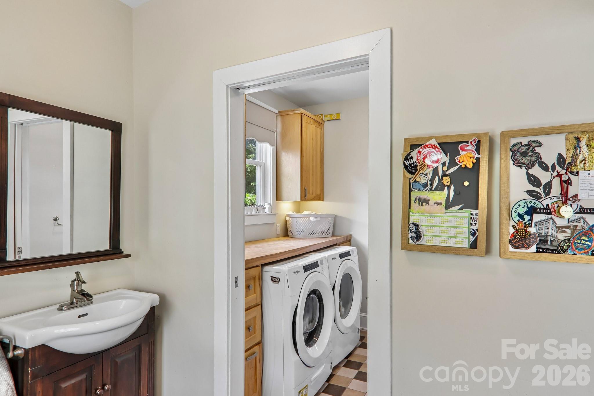 Bathroom/laundry room on main - 23 Tuskeegee Street, Asheville