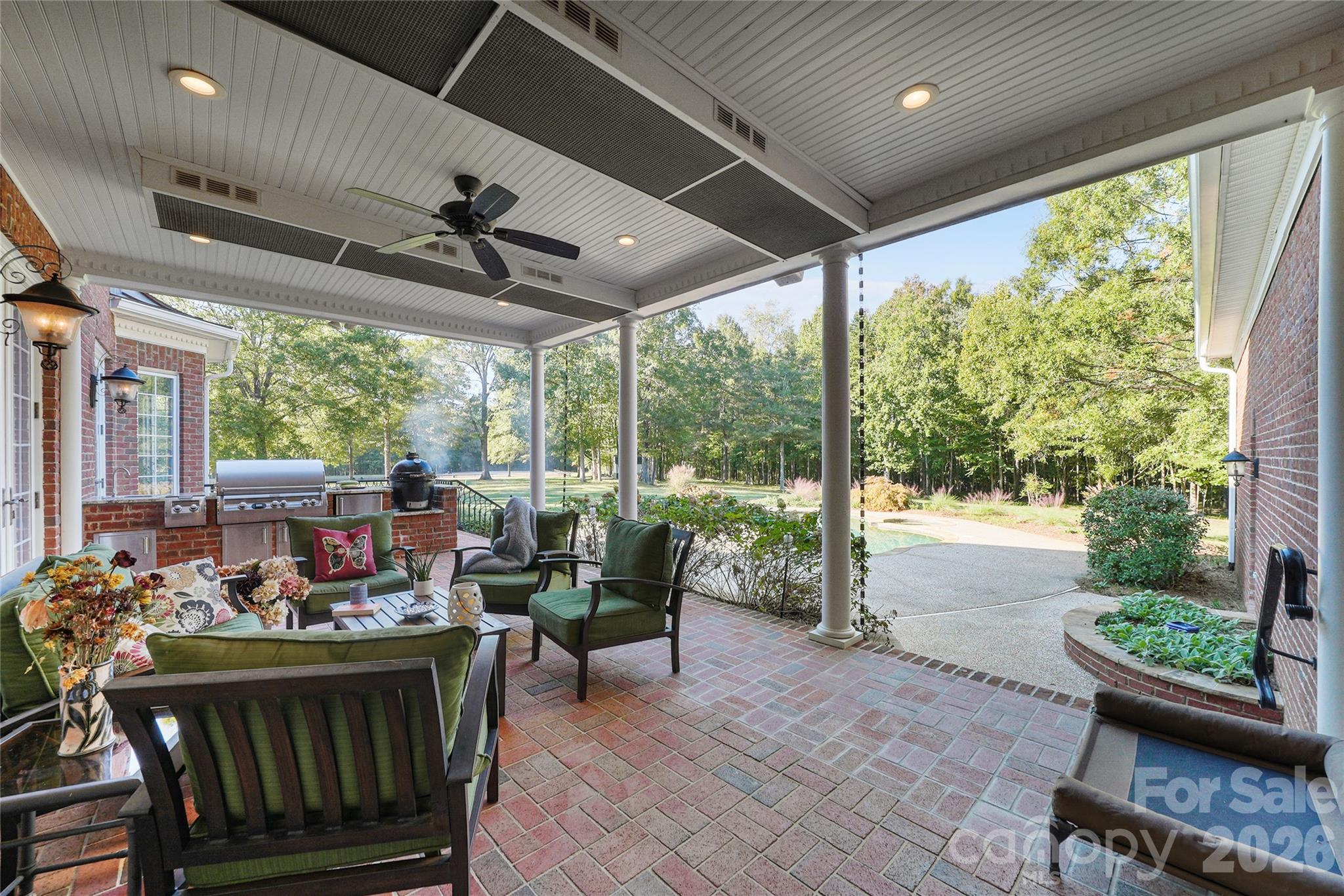 Outdoor living with covered heated patio and outdoor kitchen - 5971 Union Road, Gastonia