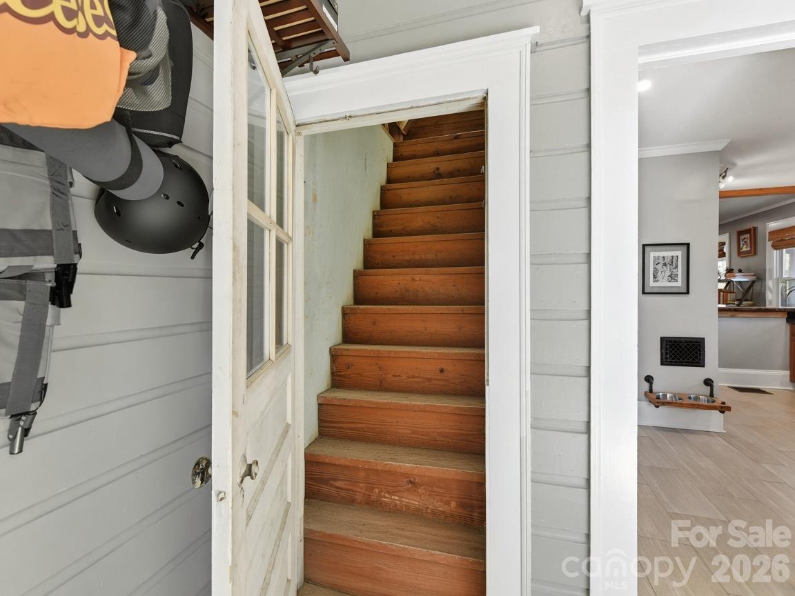 Stairs to attic with over 1,200 sq ft that would be perfect additional sq footage - 415 West Boulevard, Charlotte
