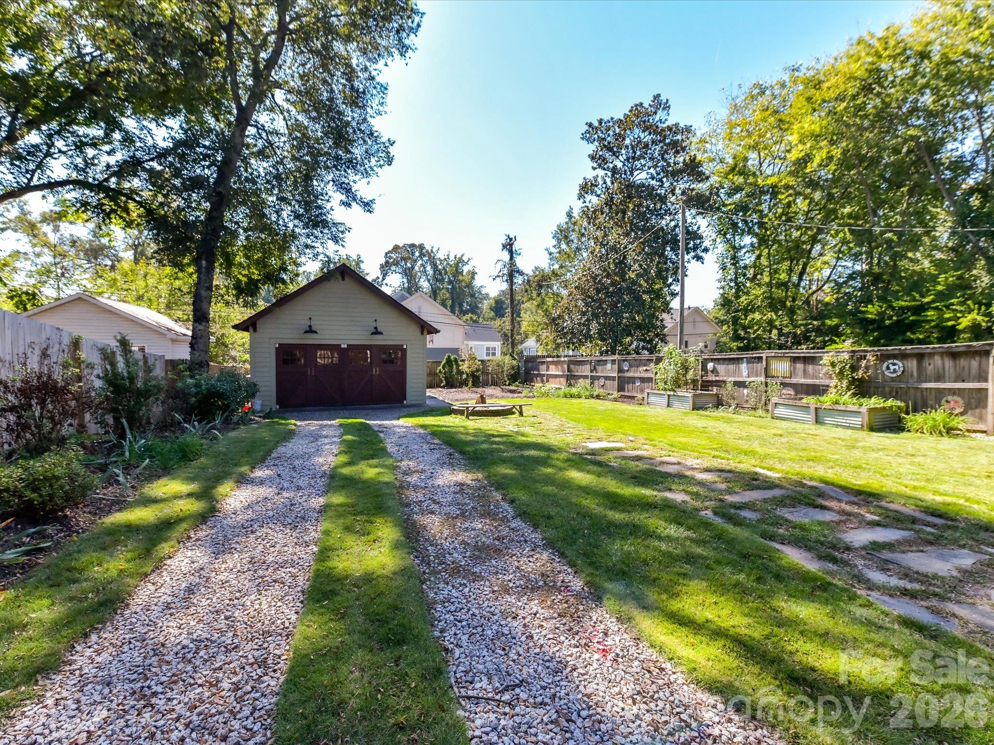 Driveway leading to custom detached garage / workshop - 415 West Boulevard, Charlotte