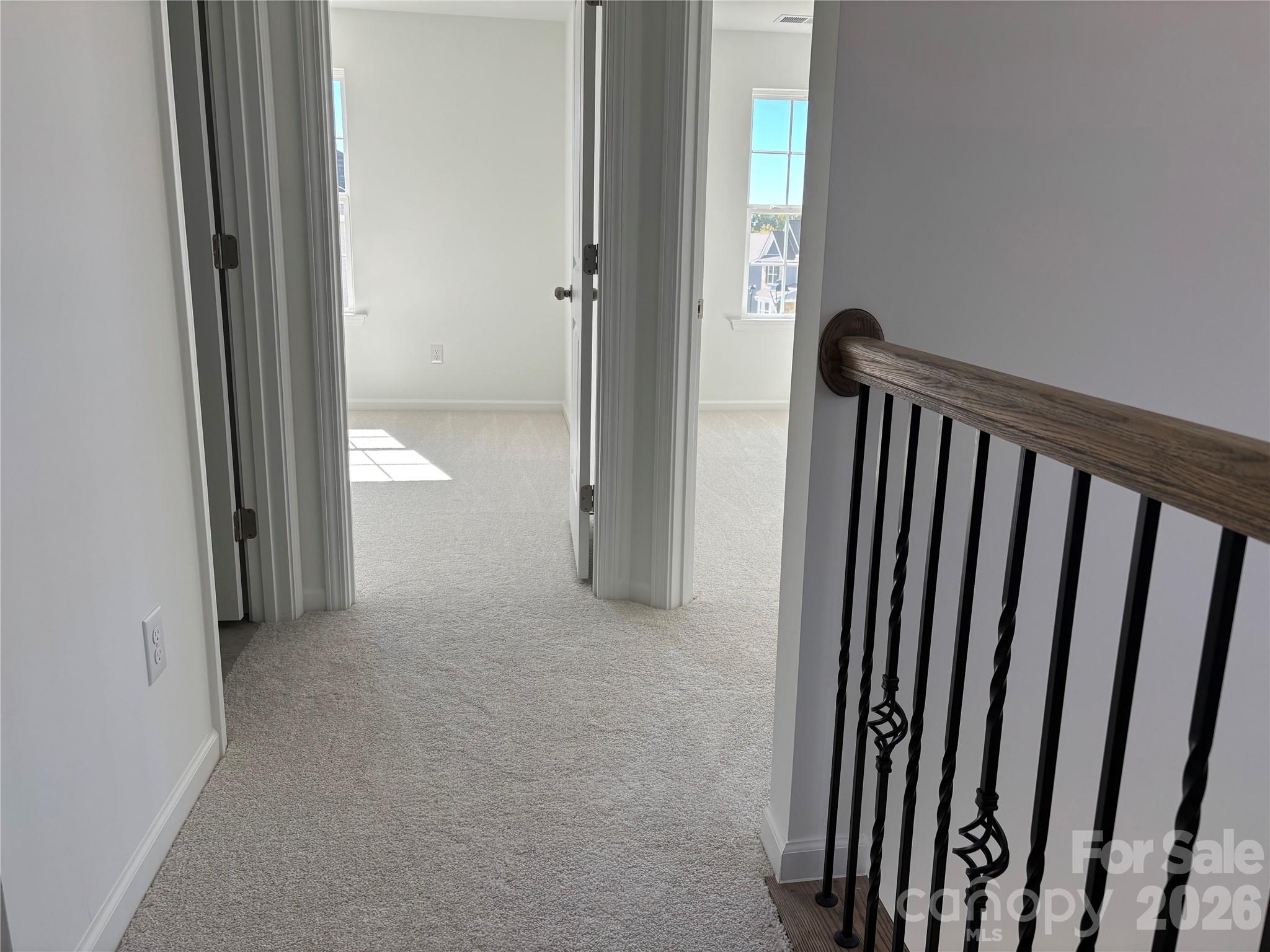 Back in the hall upstairs... two more bedrooms and another full bath! - 1717 Grassy Knoll Trail, Maiden