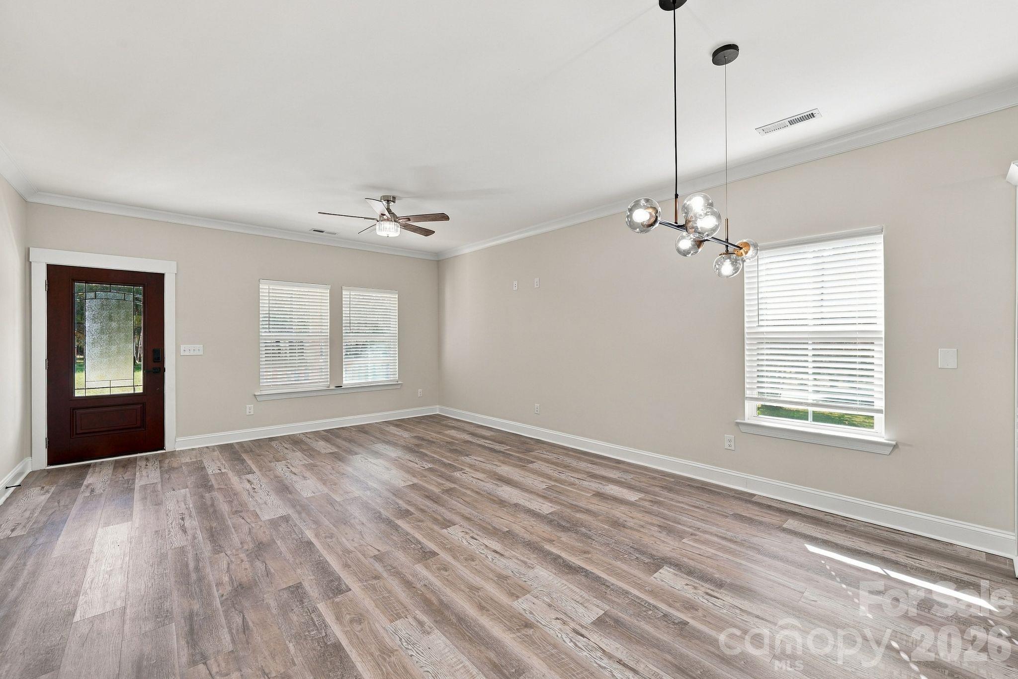 Living area- Great fixtures throughout the home - 4224 Pebblebrook Circle, Concord