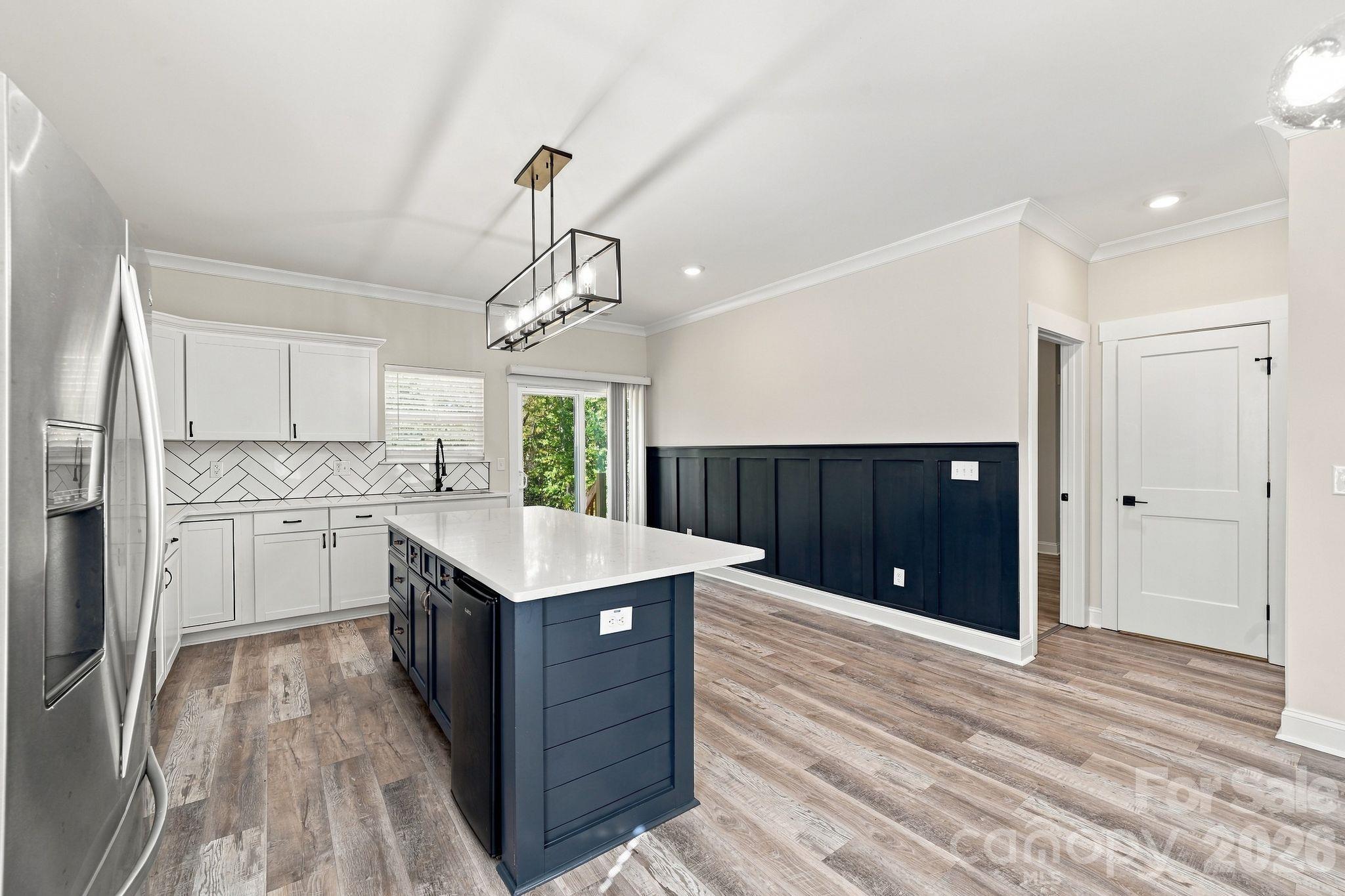 Kitchen island including a mini fridge - 4224 Pebblebrook Circle, Concord