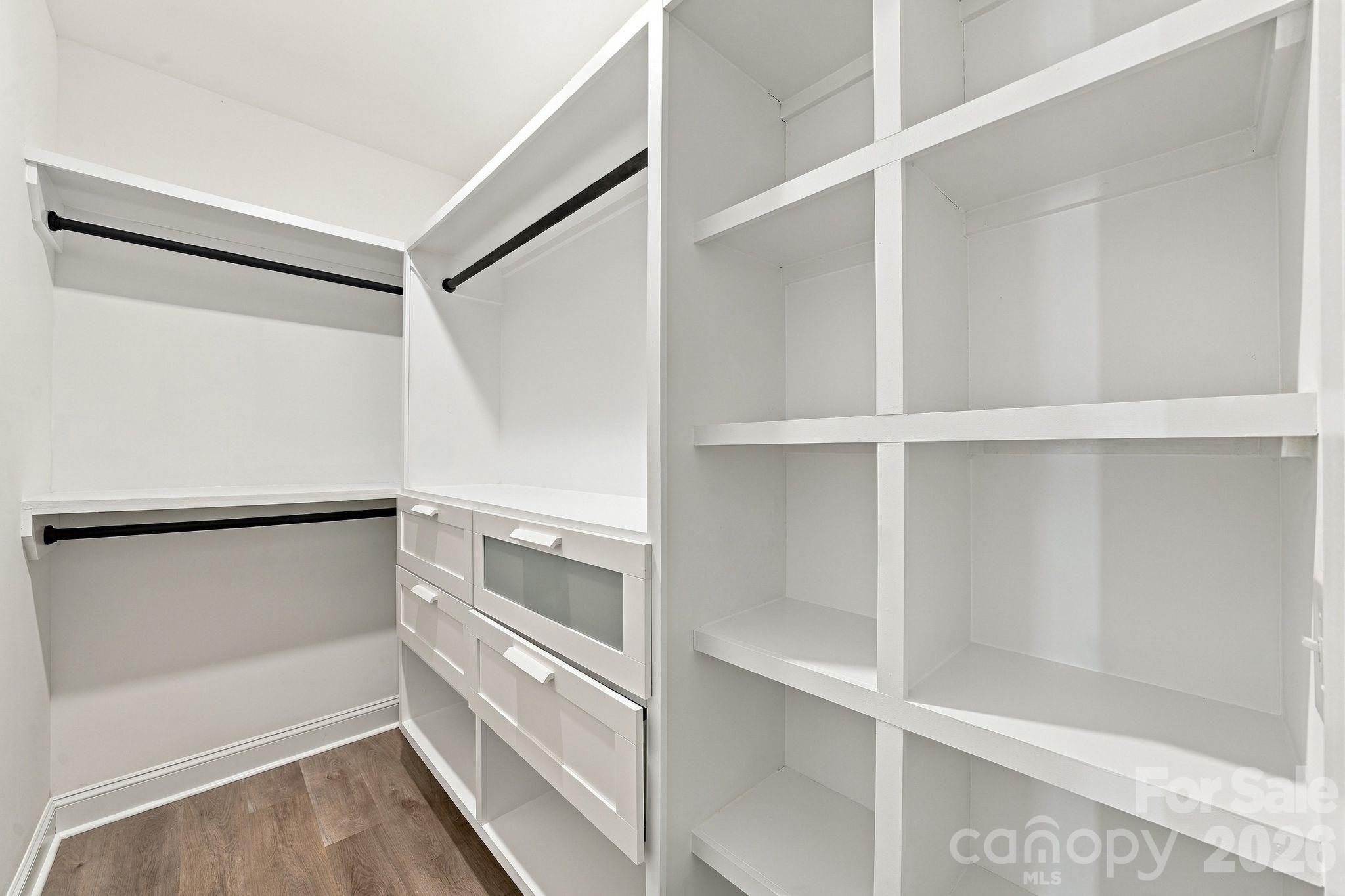 Walk in closet in primary with custom closets - 4224 Pebblebrook Circle, Concord