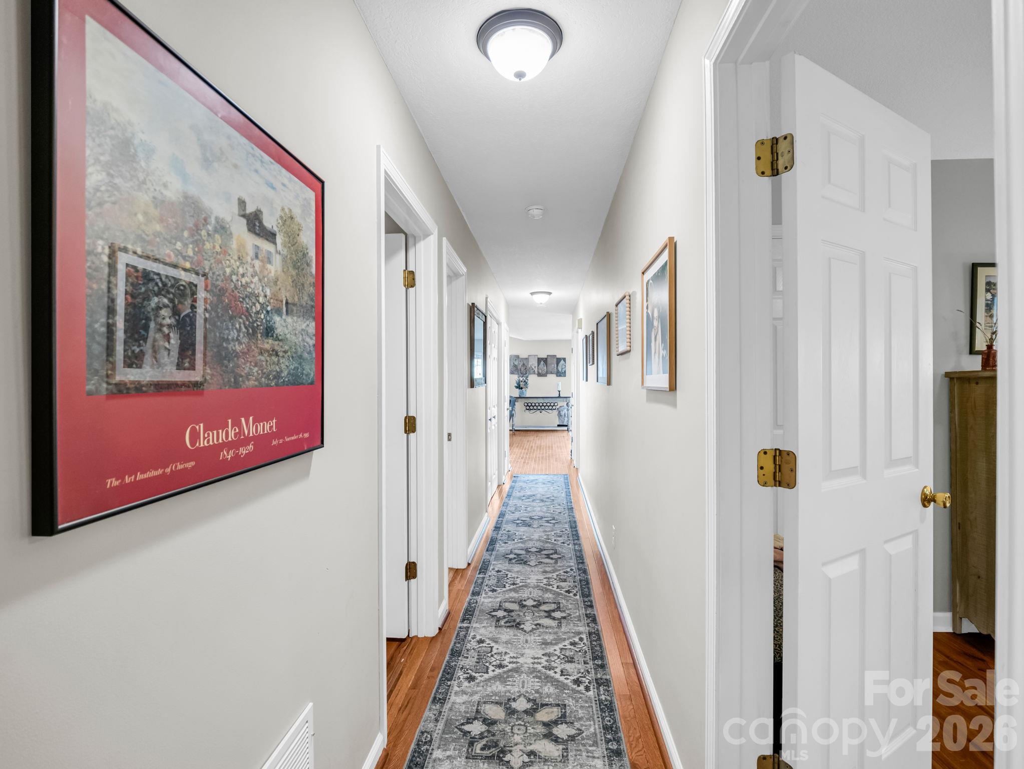 Hallway from Bedrooms to Main Living Area - 178 Hilltop View Drive, Fletcher