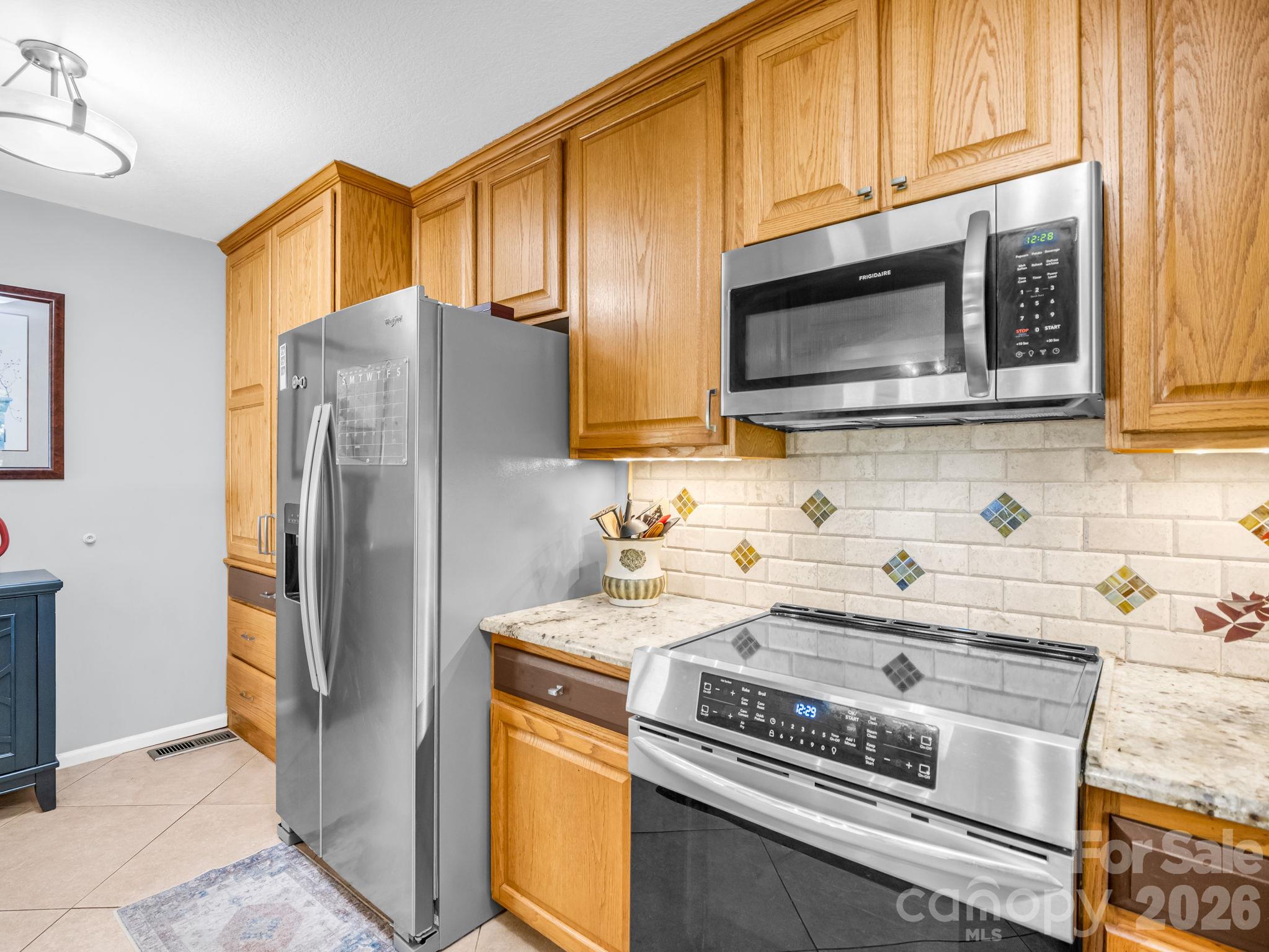 New refrigerator and induction oven with built in air fryer. - 178 Hilltop View Drive, Fletcher