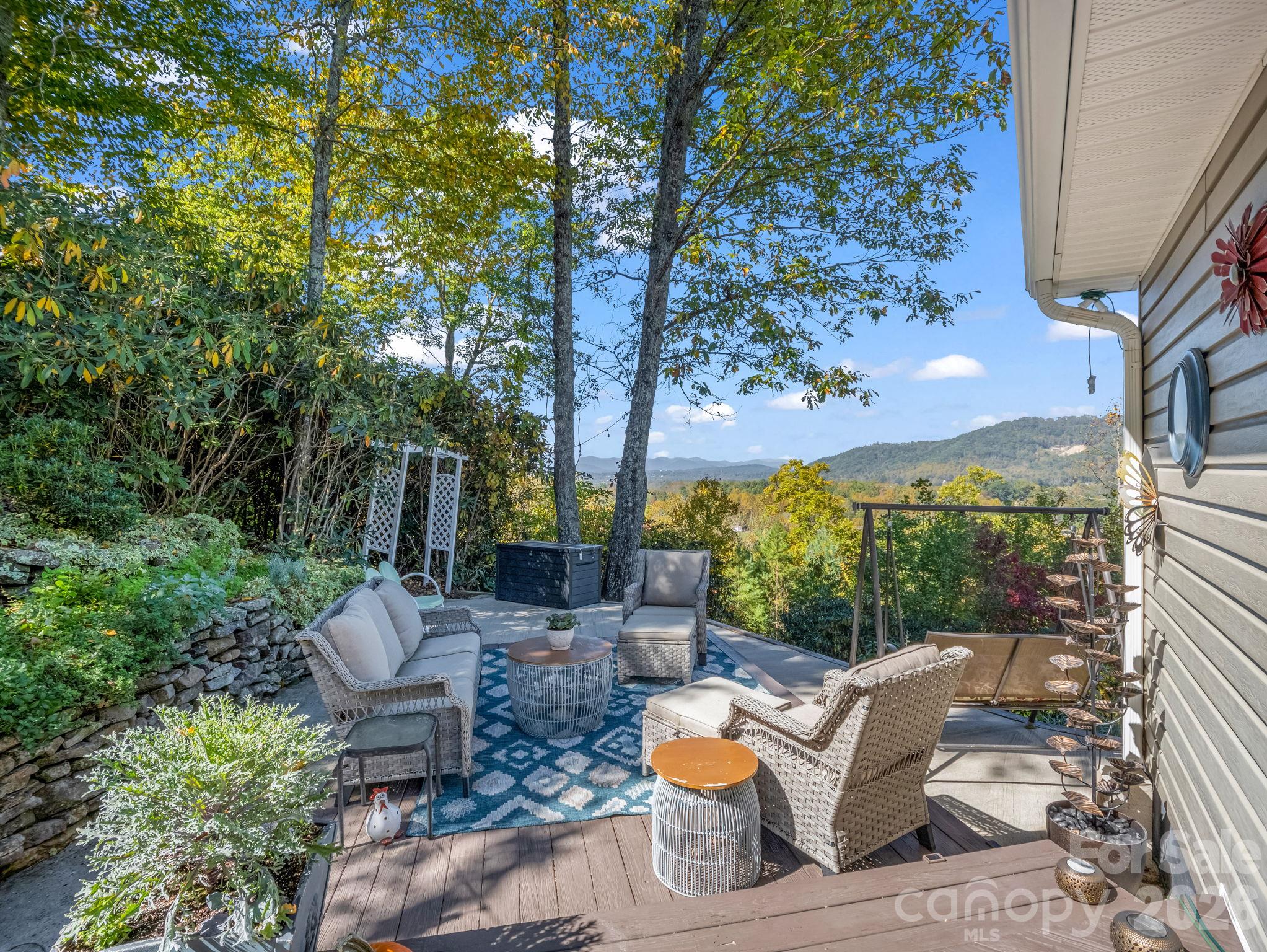 Enjoy the mountain views from the back patio. - 178 Hilltop View Drive, Fletcher
