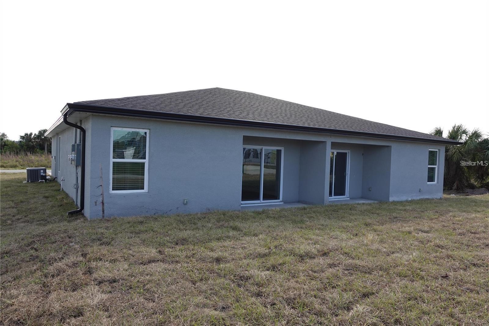 This is the model home picture. - 17099 CARLEEN AVE, PORT CHARLOTTE