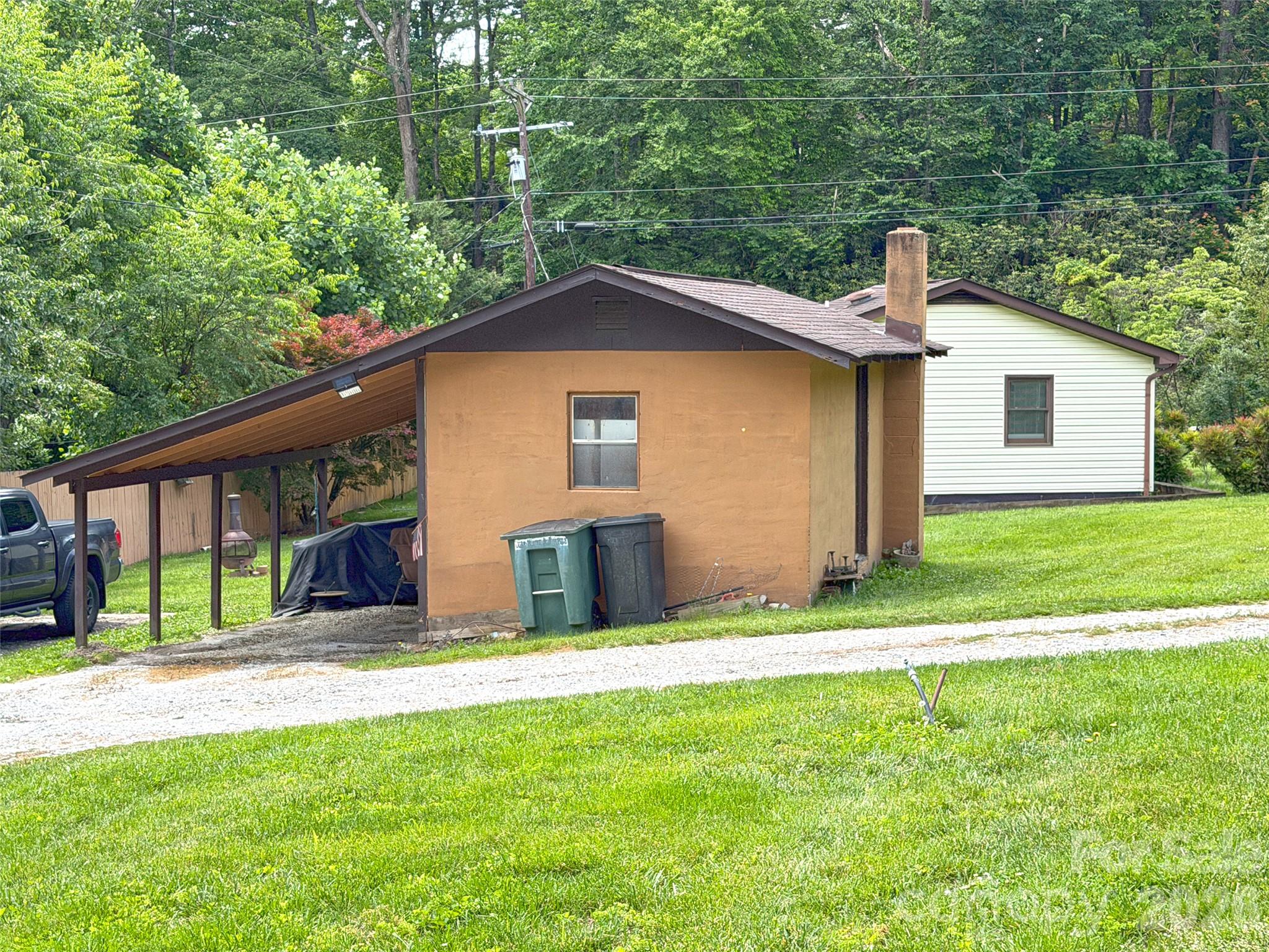 Older storage structure and carport. - 22 McMinn Road, Hendersonville