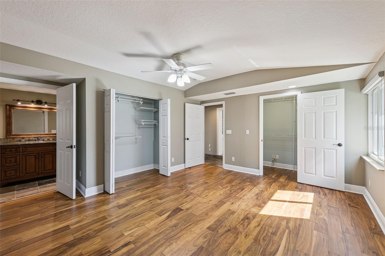 Huge Primary Bedroom with 2 large closets and new wood luxury vinyl flooring - 3115 HARGILL DR, ORLANDO