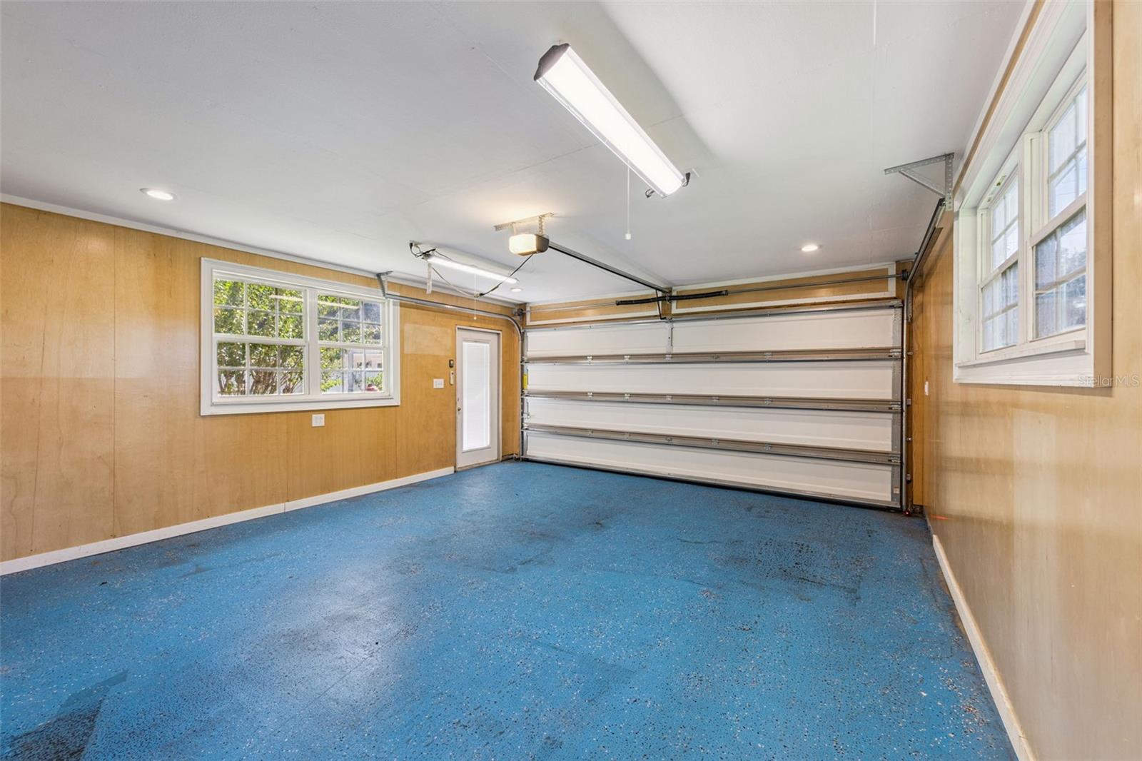 Front of the tandem 4 car garage is open for your vehicles. - 3115 HARGILL DR, ORLANDO