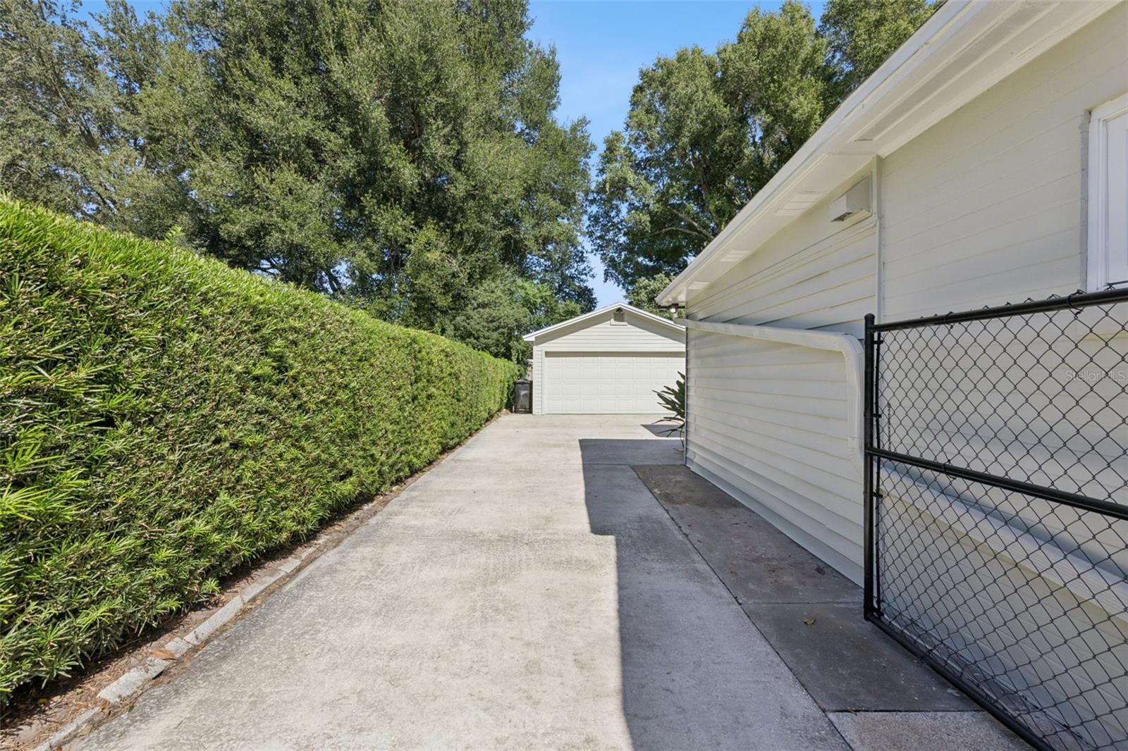 Driveway back to the 4 car tandem garage. - 3115 HARGILL DR, ORLANDO