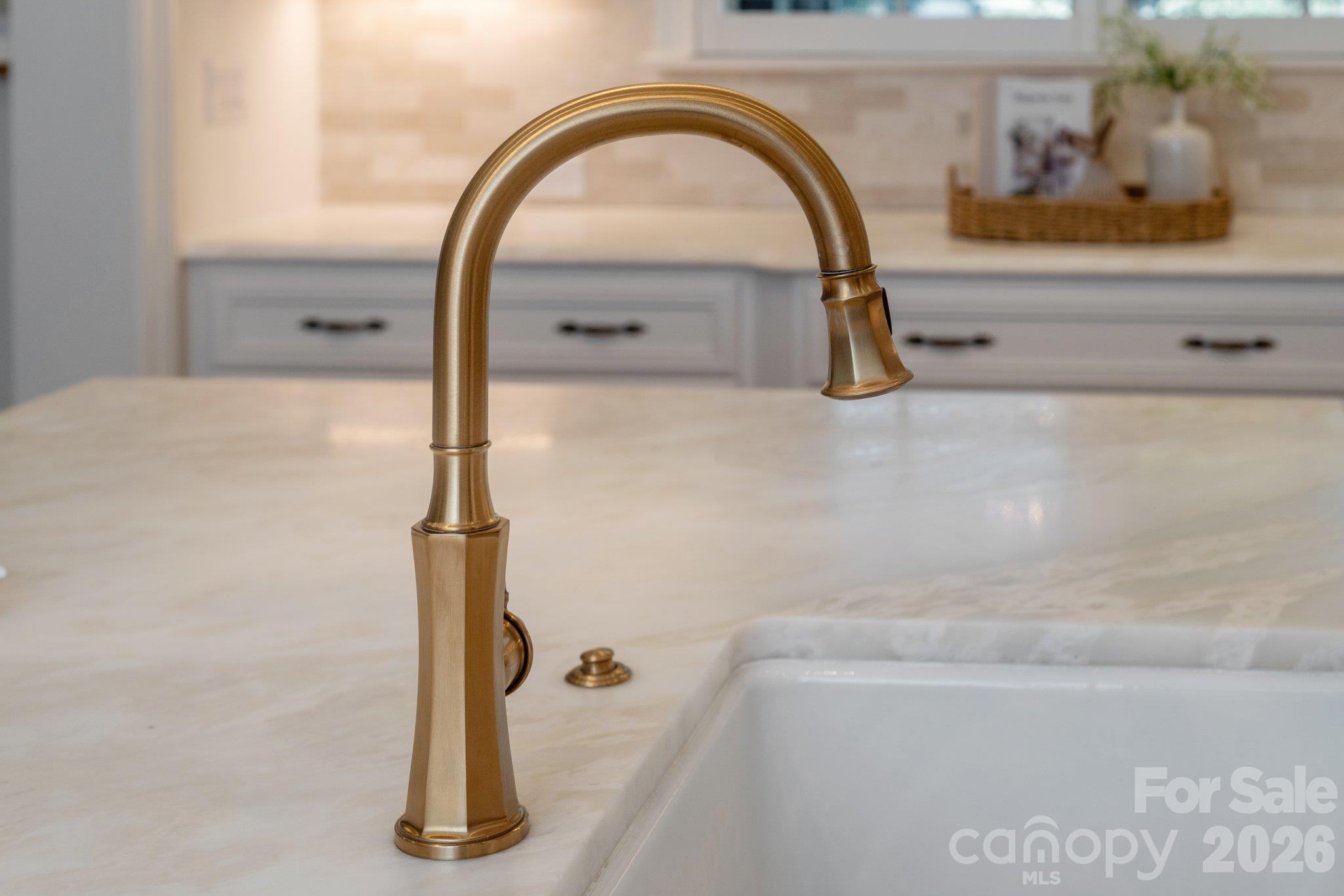 Farm sink with upscale fixutres. - 7805 Clovervale Drive, Waxhaw