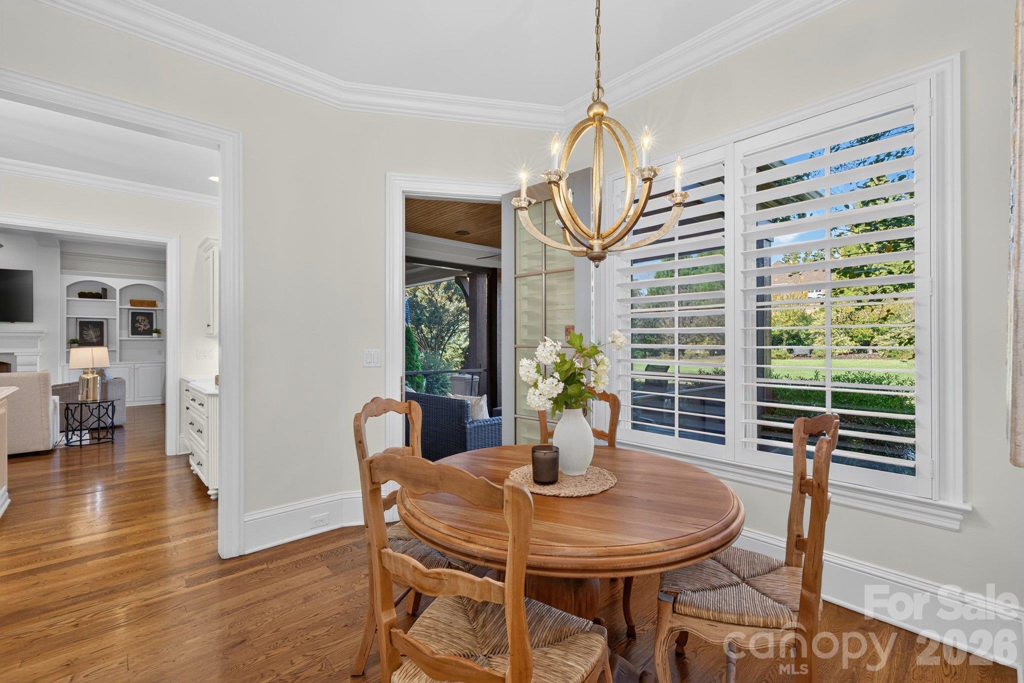 Breakfast room off the kitchen w/screened porch & patio access - 7805 Clovervale Drive, Waxhaw